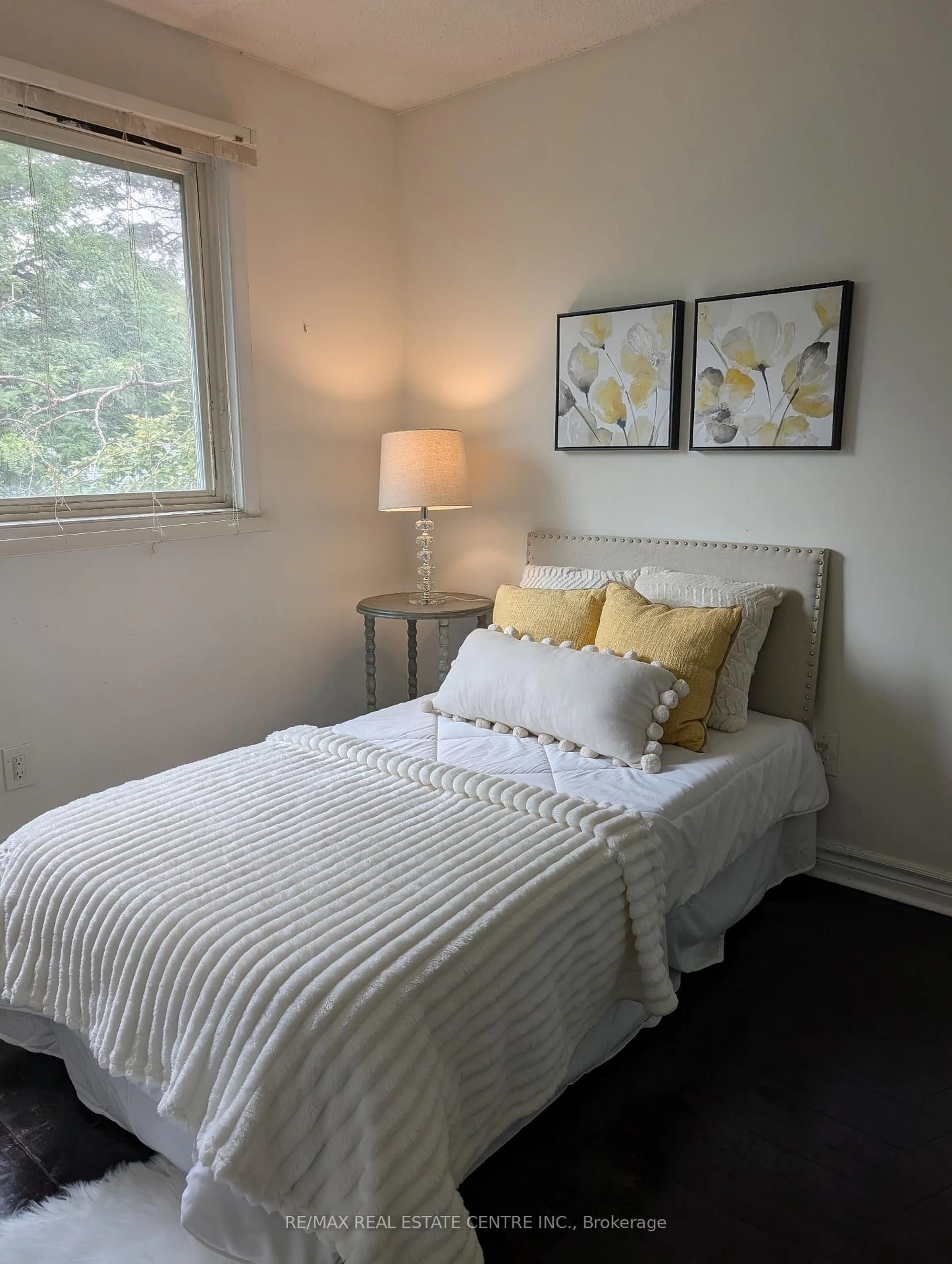 Bedroom with bed, wood/laminate floor for 6540 Falconer Dr #30, Mississauga Ontario L5N 1M1