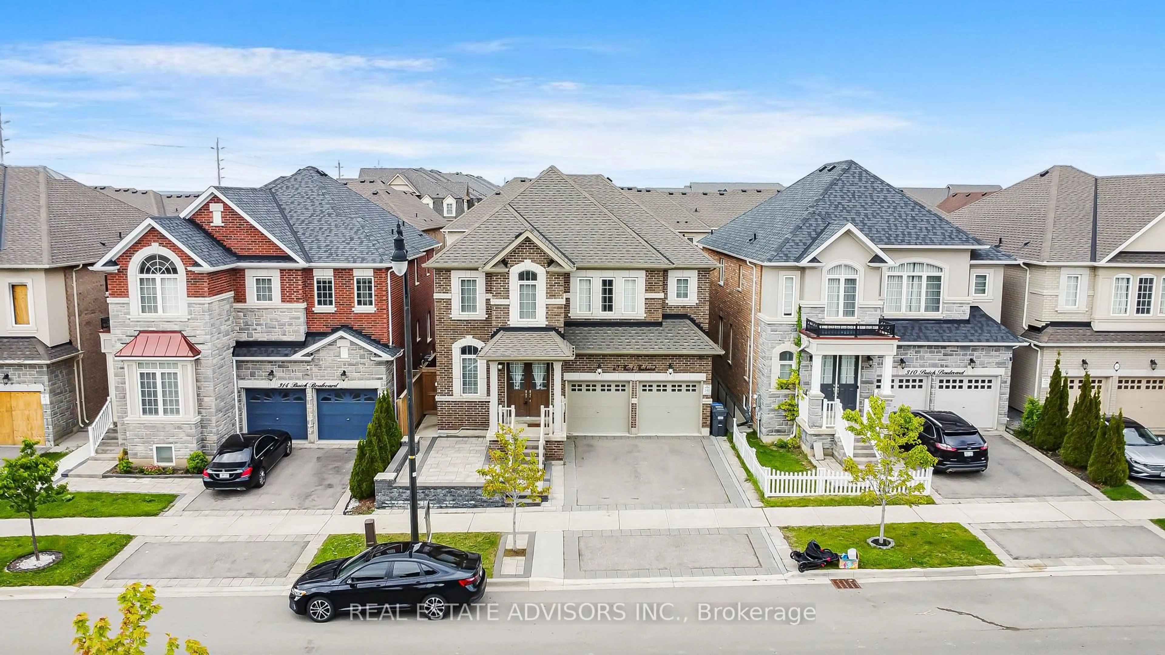 A pic from outside/outdoor area/front of a property/back of a property/a pic from drone, street for 312 Buick Blvd, Brampton Ontario L7A 4L8