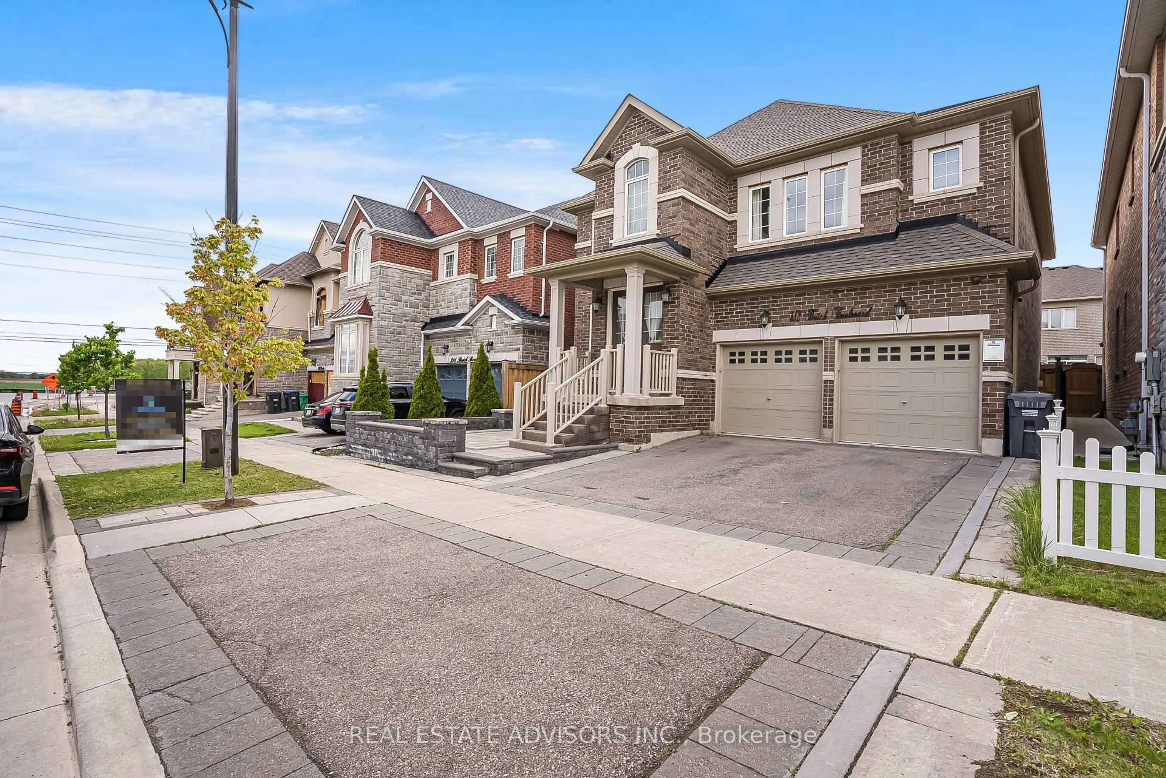 Home with brick exterior material, street for 312 Buick Blvd, Brampton Ontario L7A 4L8
