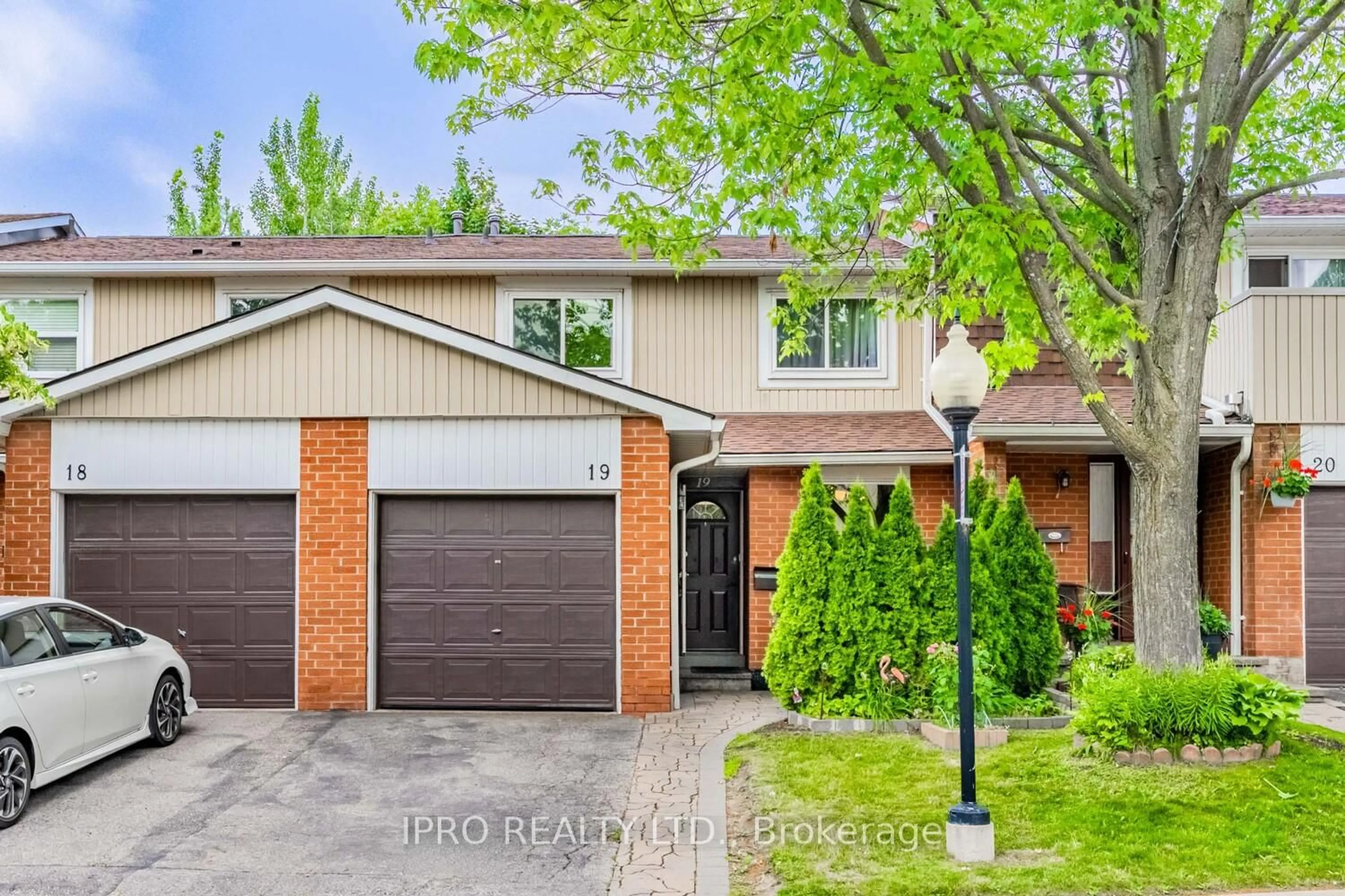 Home with brick exterior material, street for 345 Meadows Blvd #19, Mississauga Ontario L4Z 1G5