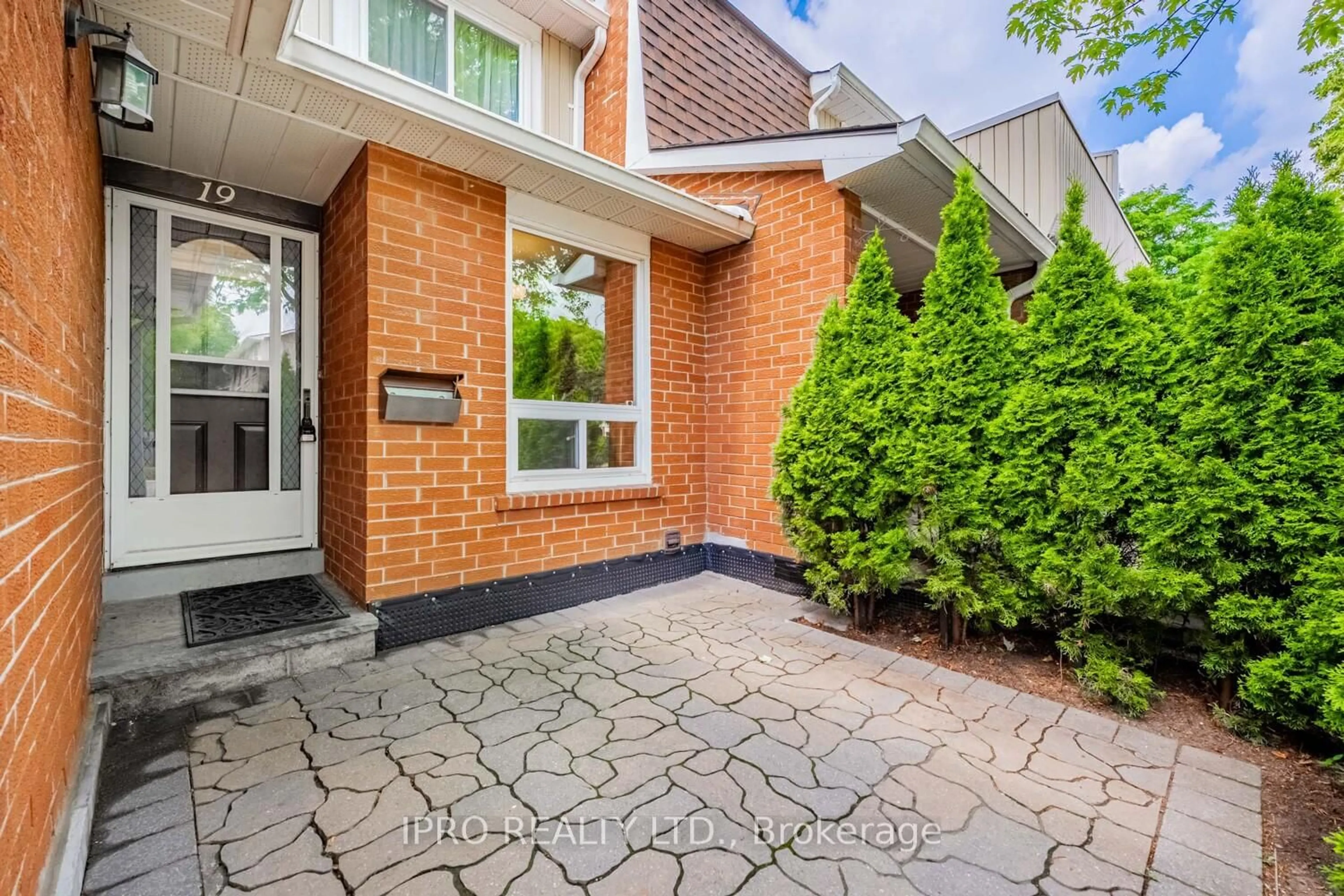 Home with brick exterior material, street for 345 Meadows Blvd #19, Mississauga Ontario L4Z 1G5