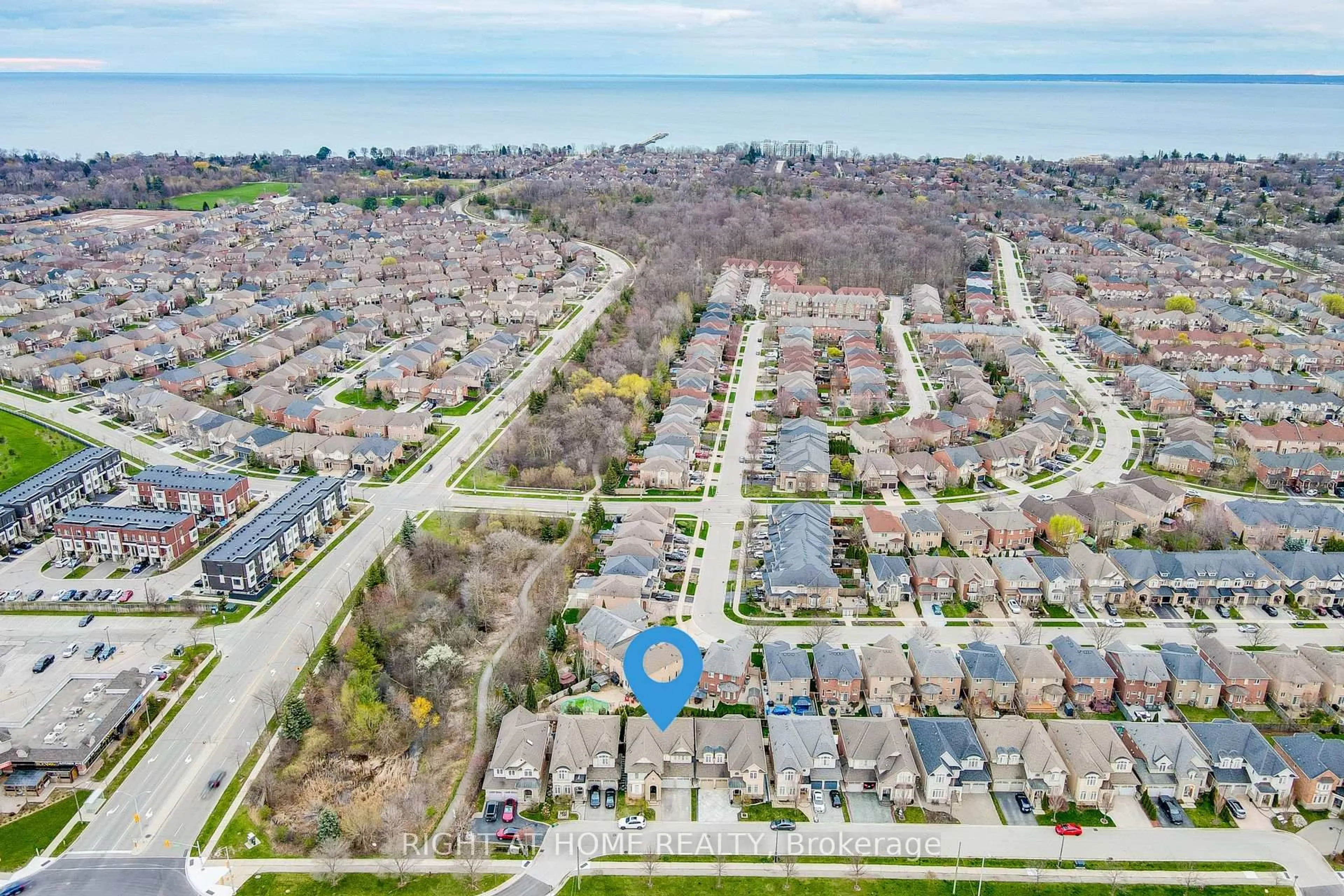 A pic from outside/outdoor area/front of a property/back of a property/a pic from drone, water/lake/river/ocean view for 3456 Rebecca St, Oakville Ontario L6L 6X9