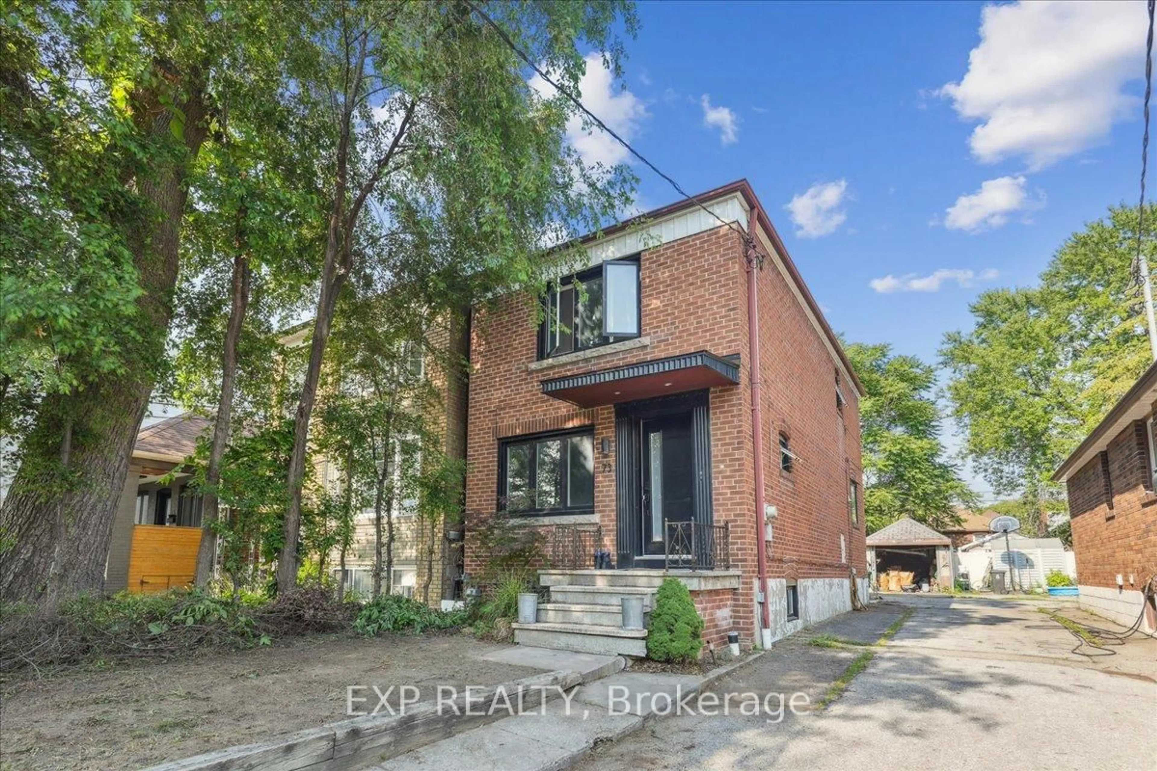 Home with brick exterior material, street for 73 Yarrow Rd, Toronto Ontario M6M 4E4