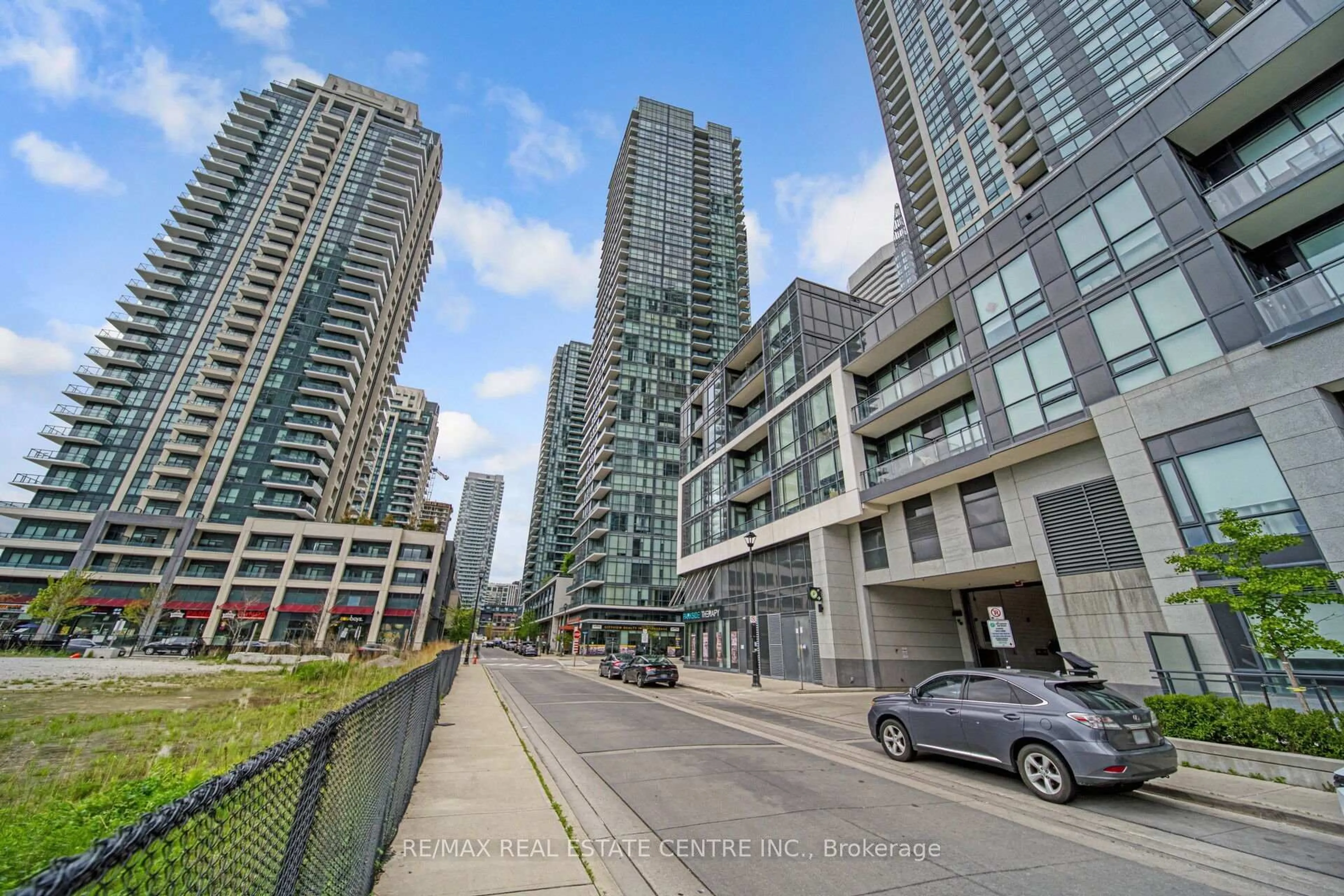 Patio, city buildings view from balcony for 4065 Brickstone Mews #1803, Mississauga Ontario L5B 0G3