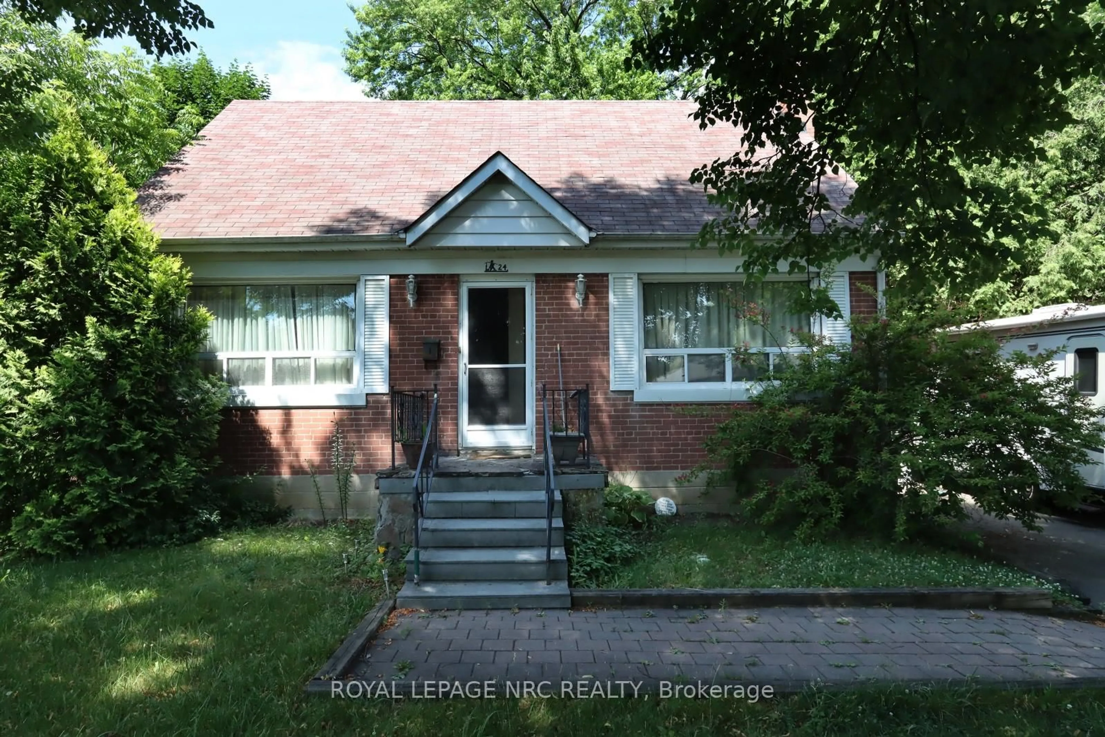 Home with brick exterior material, street for 24 Ann Arbour Rd, Toronto Ontario M9M 2J6
