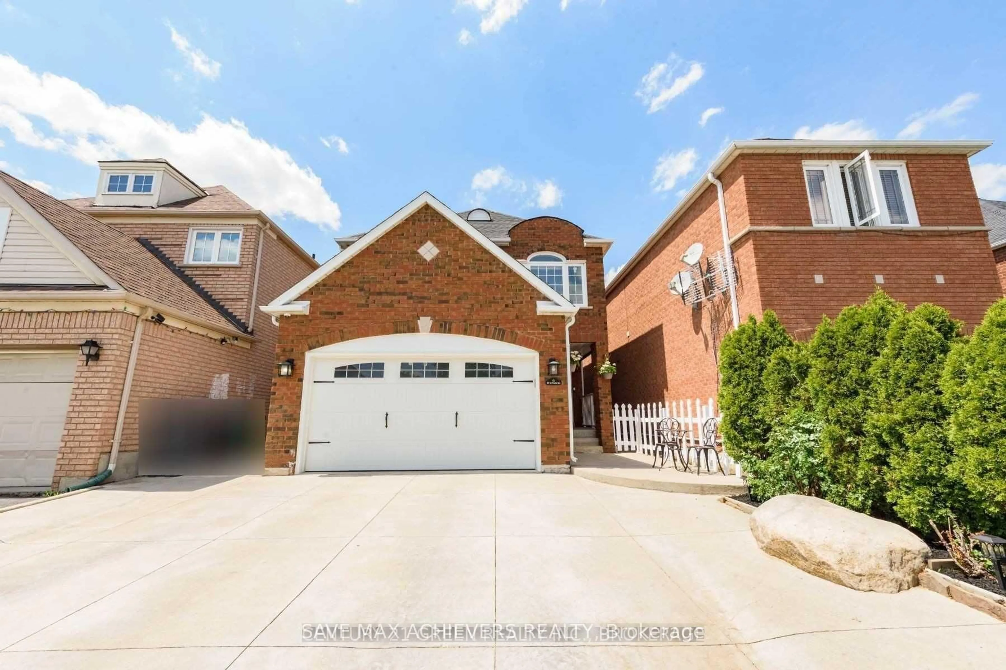 Home with brick exterior material, street for 12 Upwood Pl, Brampton Ontario L6R 1T3