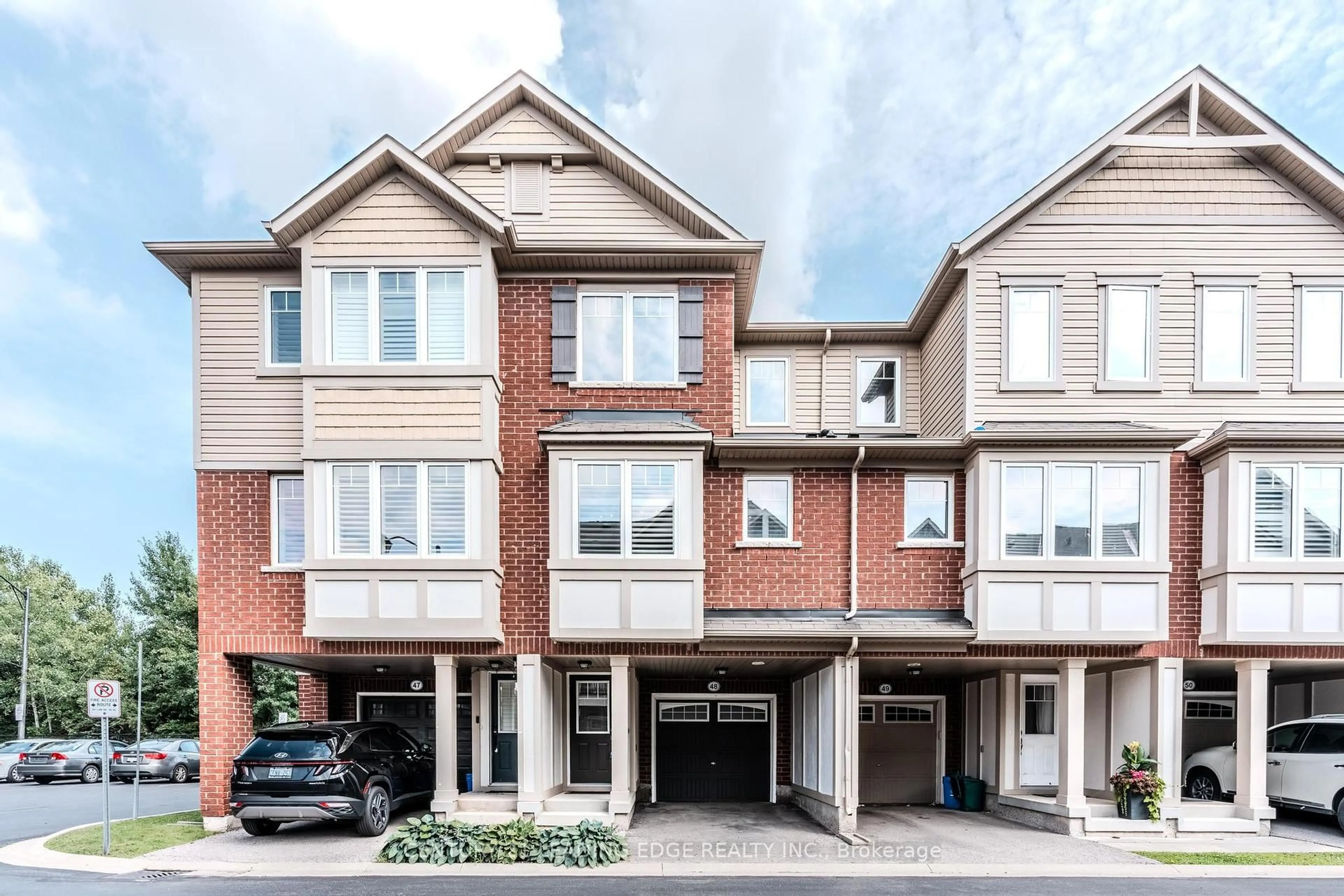 Home with brick exterior material, street for 6020 Derry Rd #48, Milton Ontario L9T 8L6