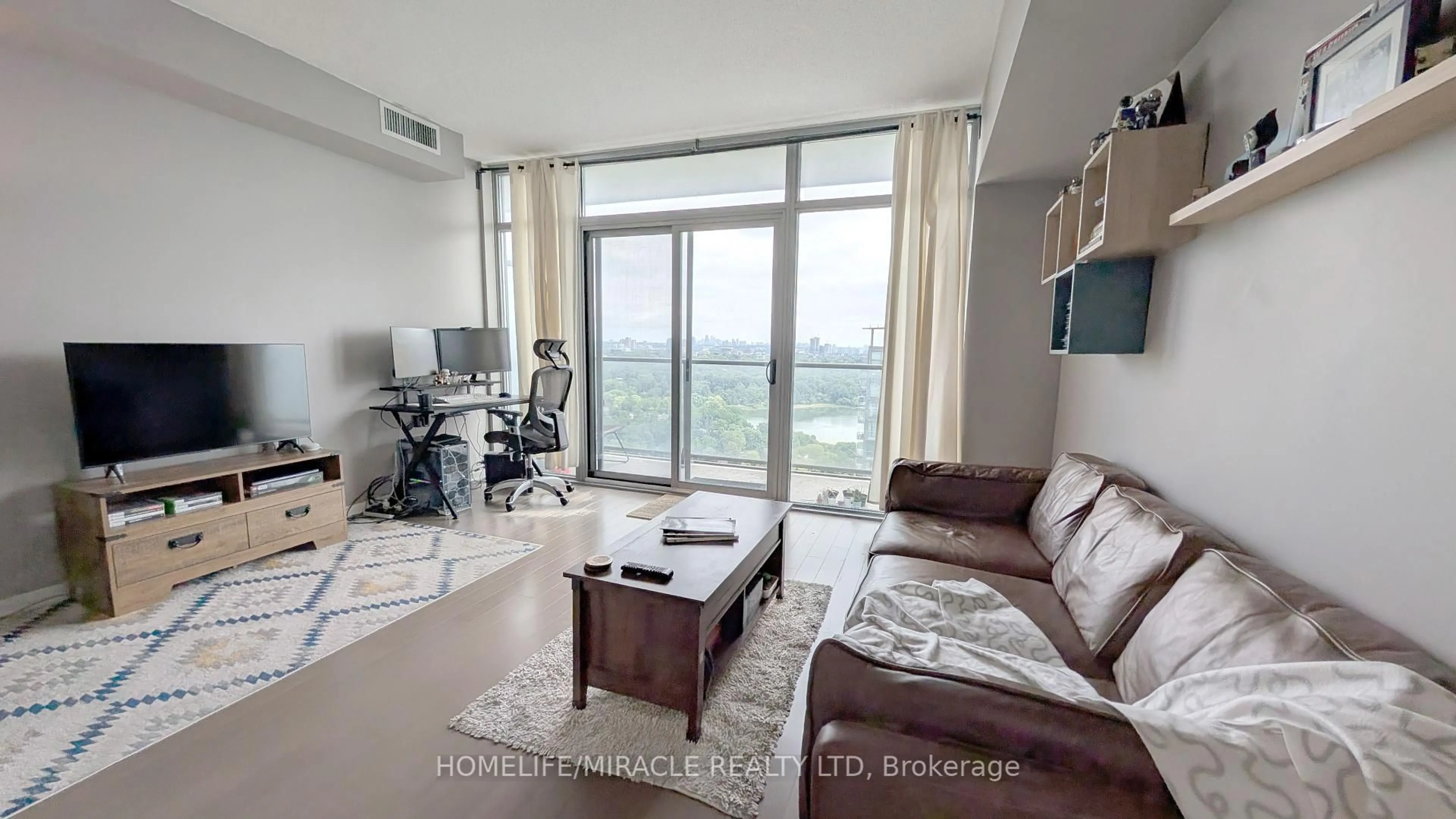 Living room with furniture, unknown for 105 The Queensway #3012, Toronto Ontario M6S 5B5