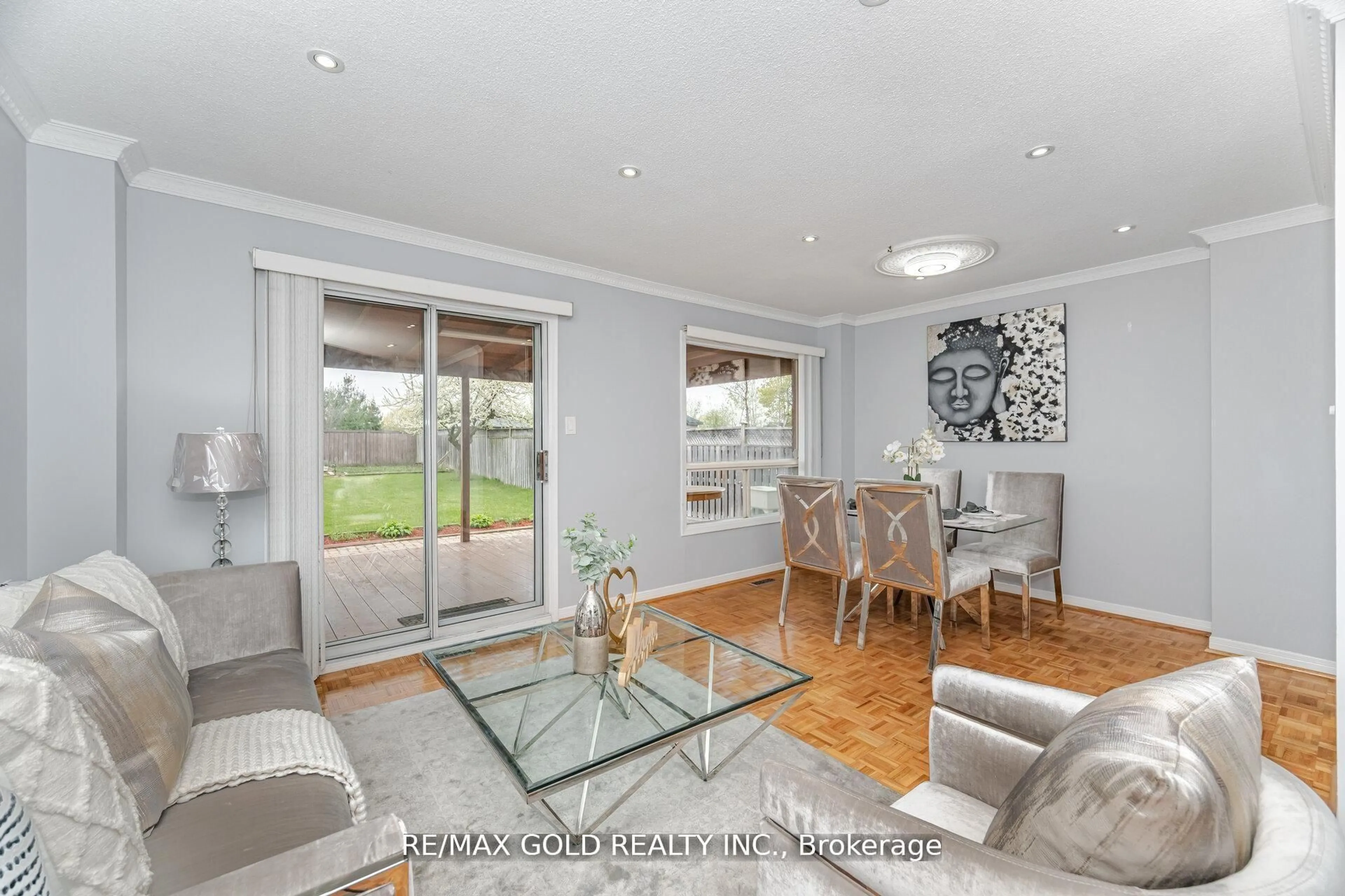 Living room with furniture, wood/laminate floor for 58 Kesteven Cres, Brampton Ontario L6W 4E5