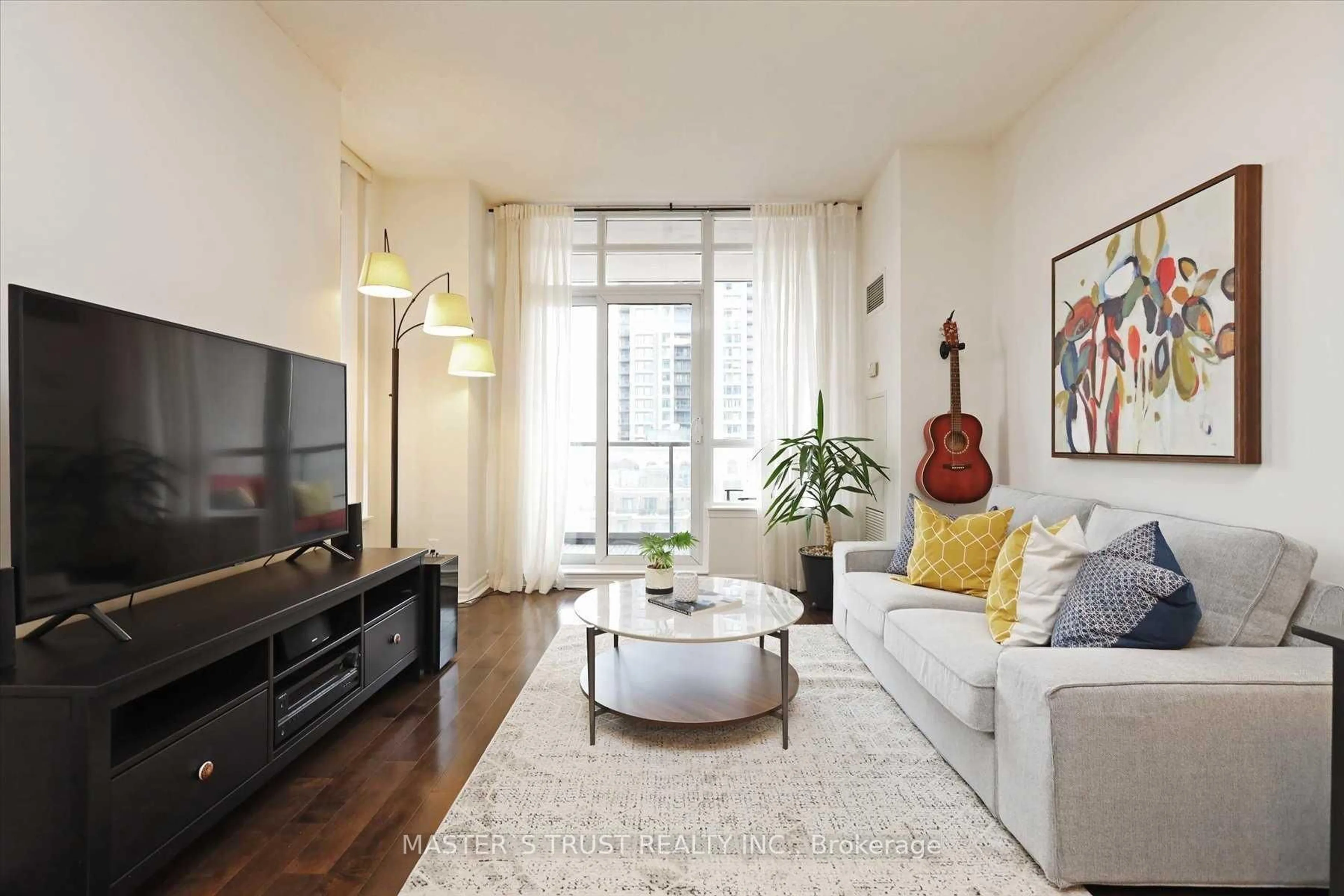 Living room with furniture, wood/laminate floor for 388 Prince Of Wales Dr #1004, Mississauga Ontario L5B 0A1
