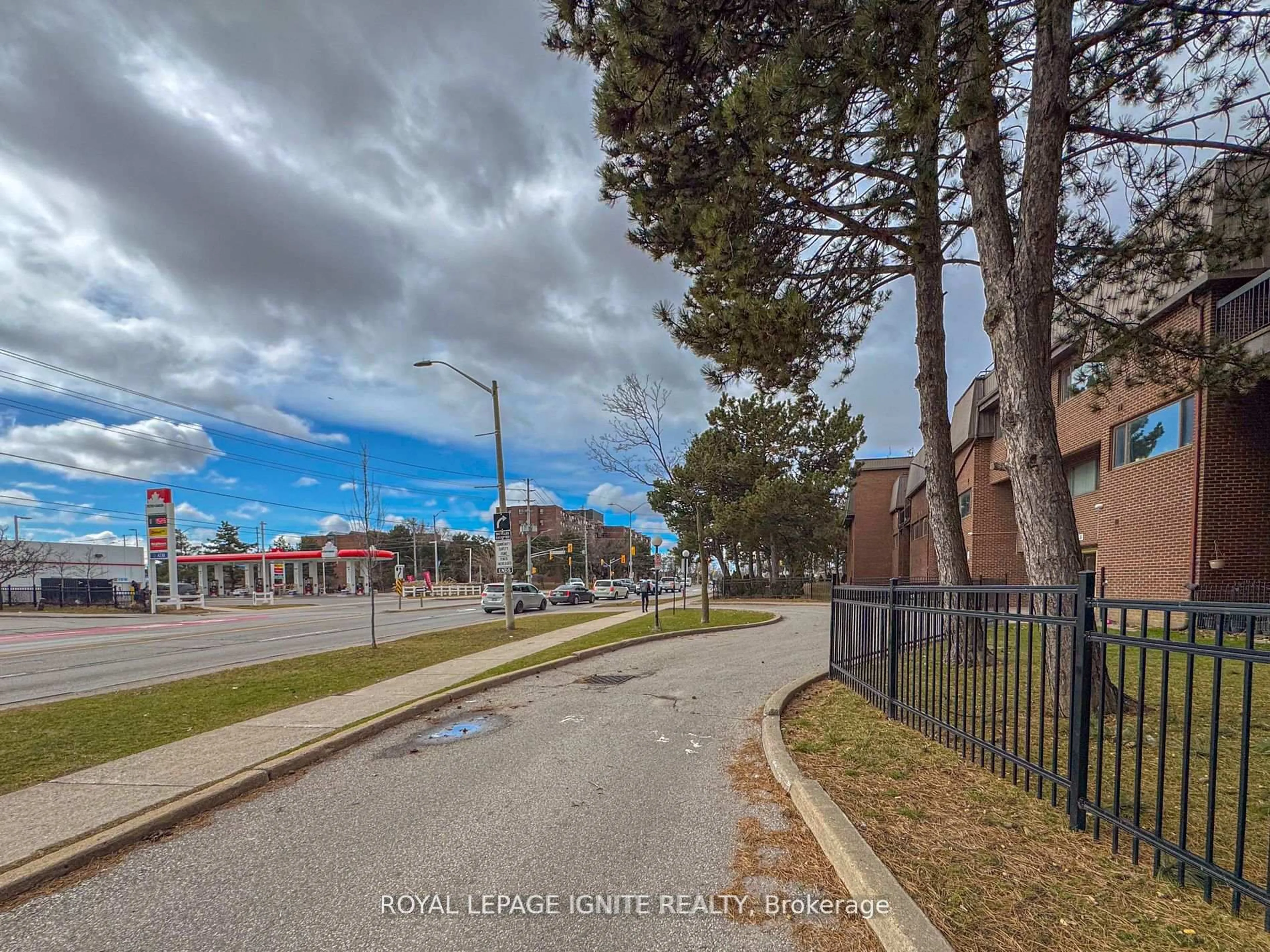 A pic from outside/outdoor area/front of a property/back of a property/a pic from drone, street for 3455 Morning Star Dr #208, Mississauga Ontario L4T 3T9
