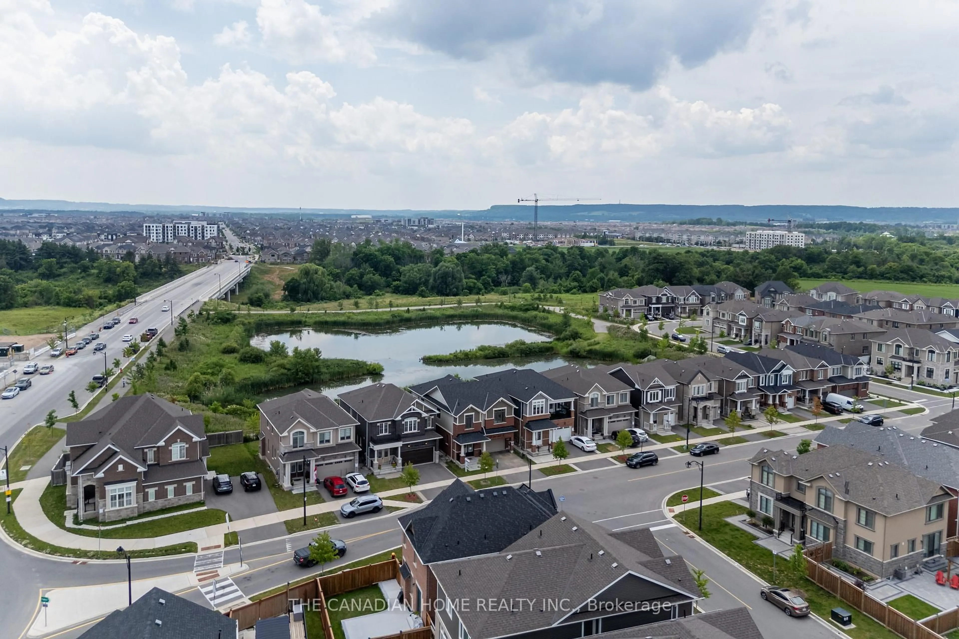 A pic from outside/outdoor area/front of a property/back of a property/a pic from drone, water/lake/river/ocean view for 115 Yates Dr, Milton Ontario L9T 2X5