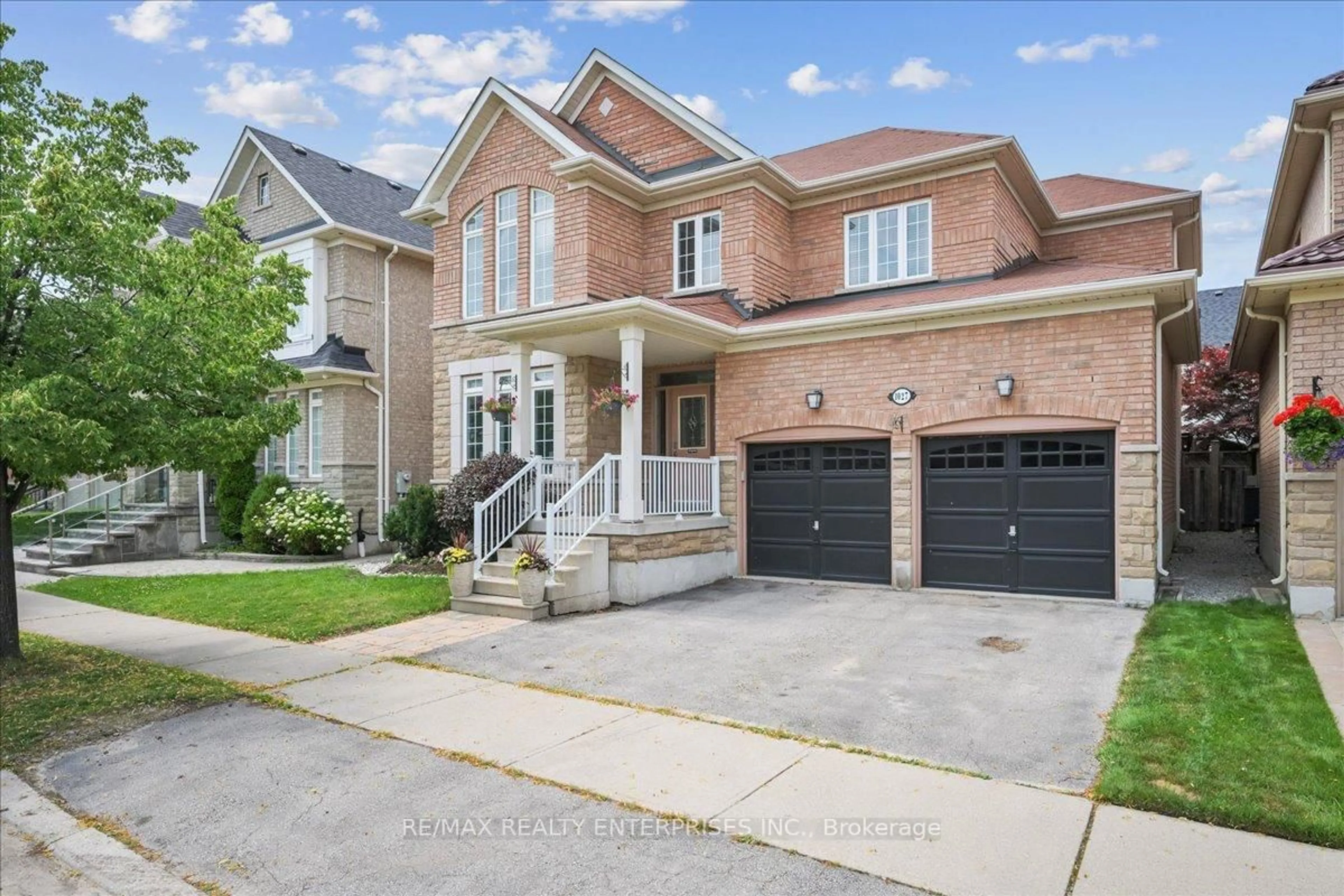 Home with brick exterior material, street for 1027 LAIDLAW Dr, Milton Ontario L9T 6S2