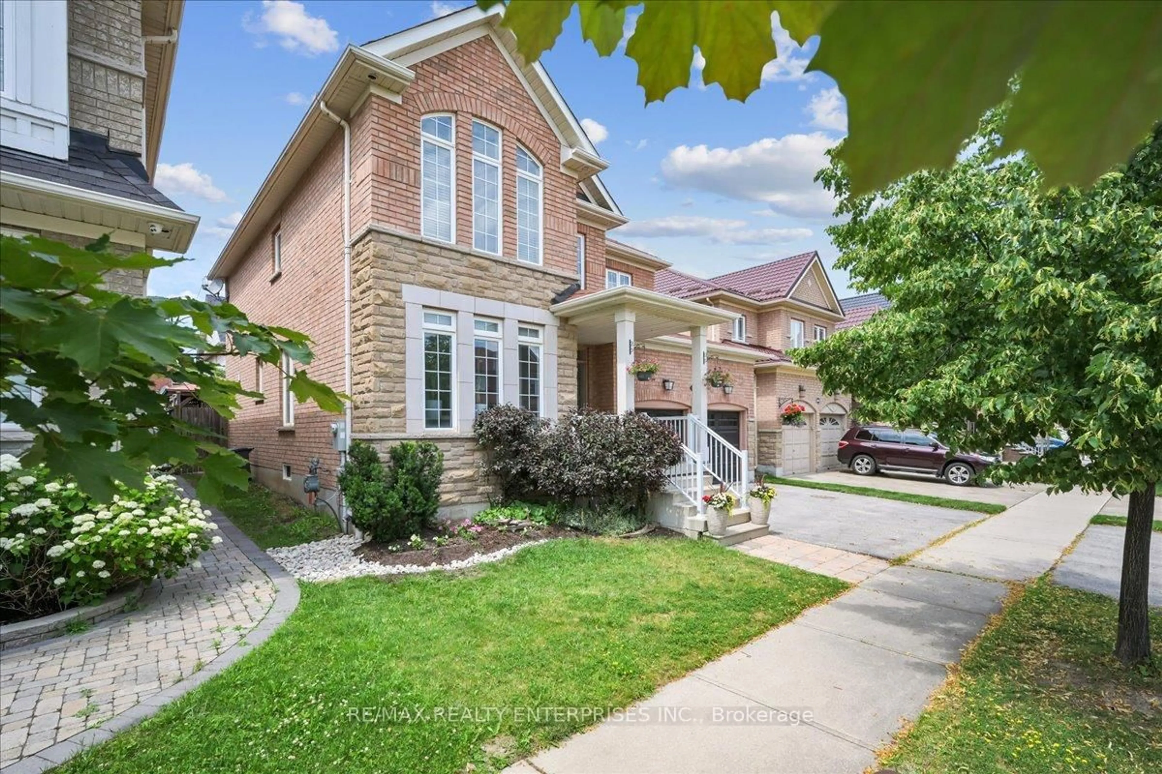 Home with brick exterior material, street for 1027 LAIDLAW Dr, Milton Ontario L9T 6S2