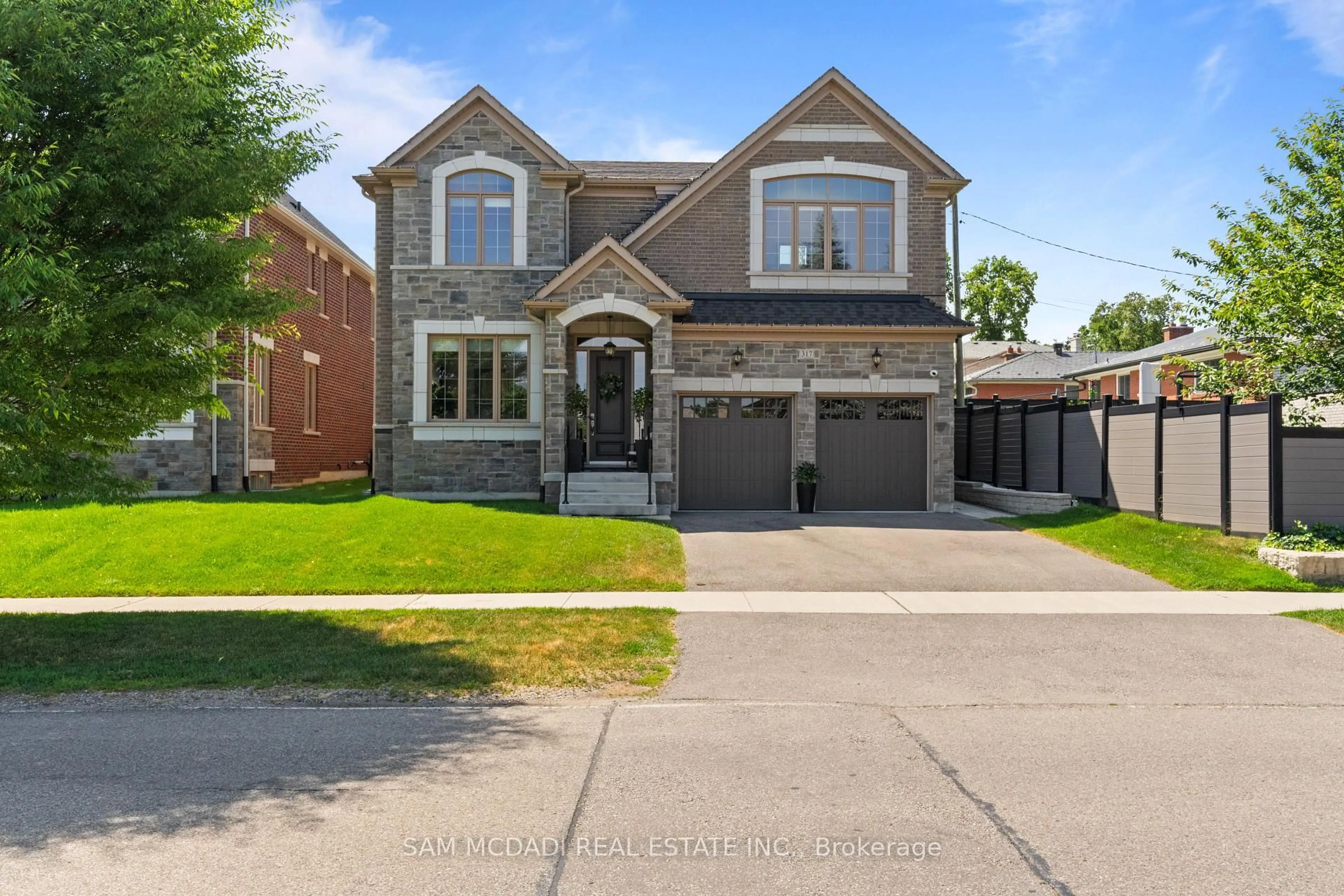 Home with brick exterior material, street for 317 La Rose Ave, Toronto Ontario M9P 1B8