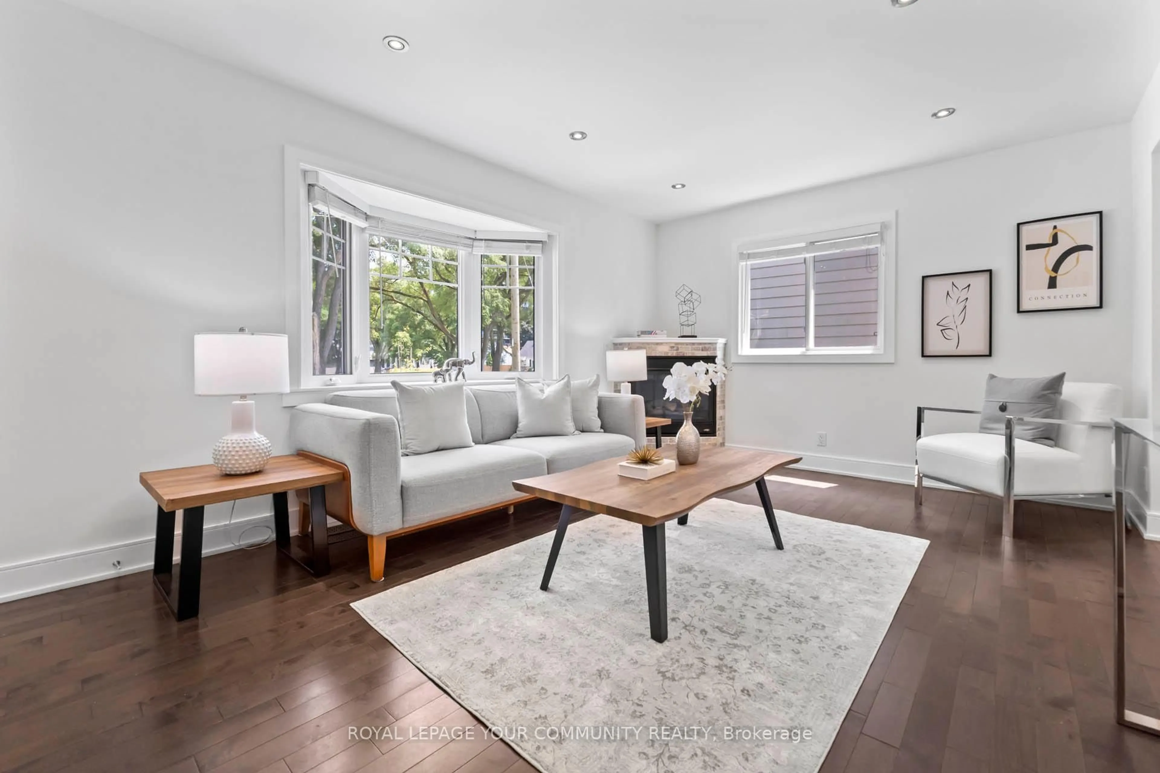 Living room with furniture, wood/laminate floor for 30 Smith Cres #Cres, Toronto Ontario M8Z 3X5