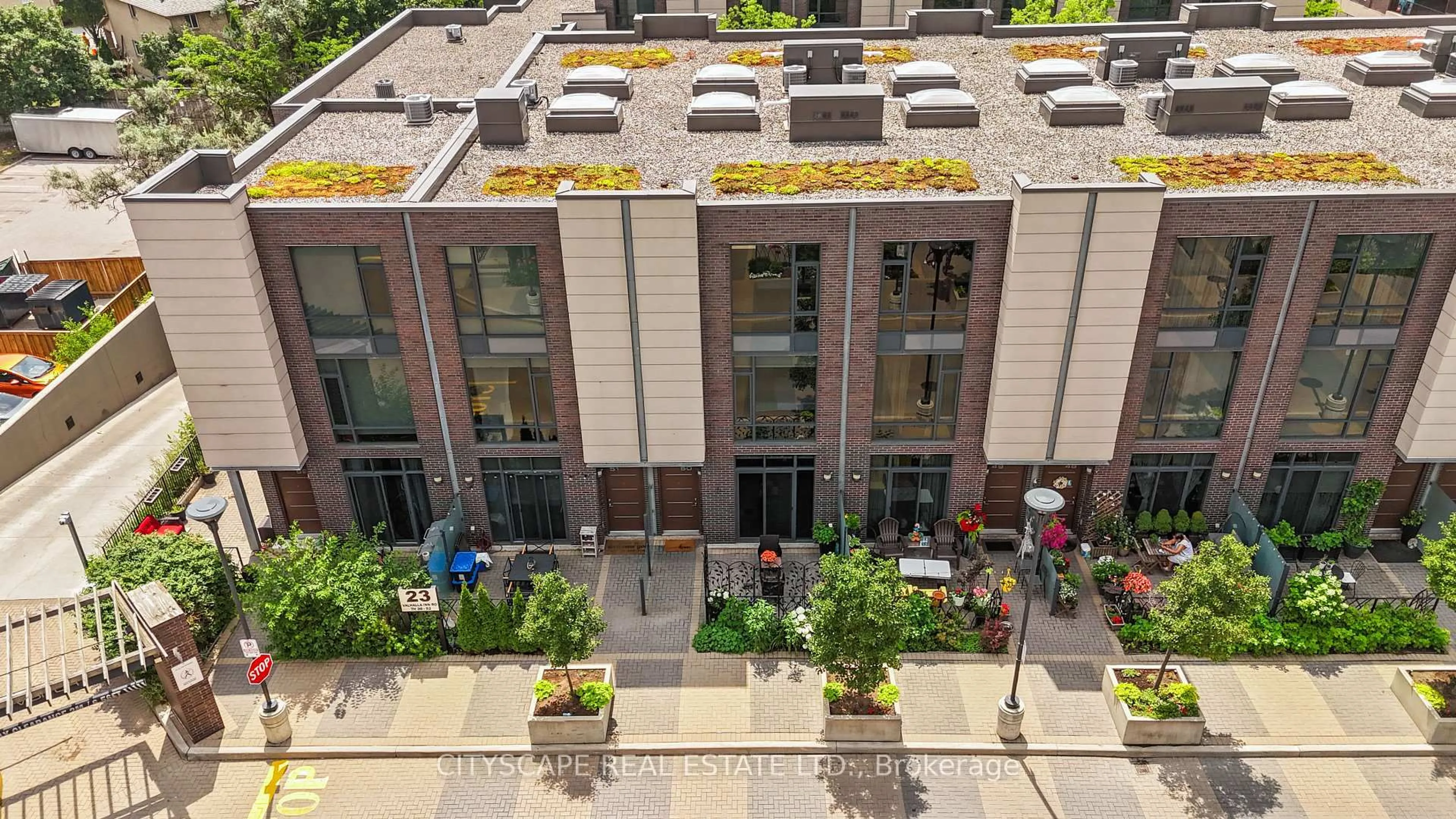 A pic from outside/outdoor area/front of a property/back of a property/a pic from drone, city buildings view from balcony for 23 Valhalla Inn Rd #50, Toronto Ontario M9B 1S9