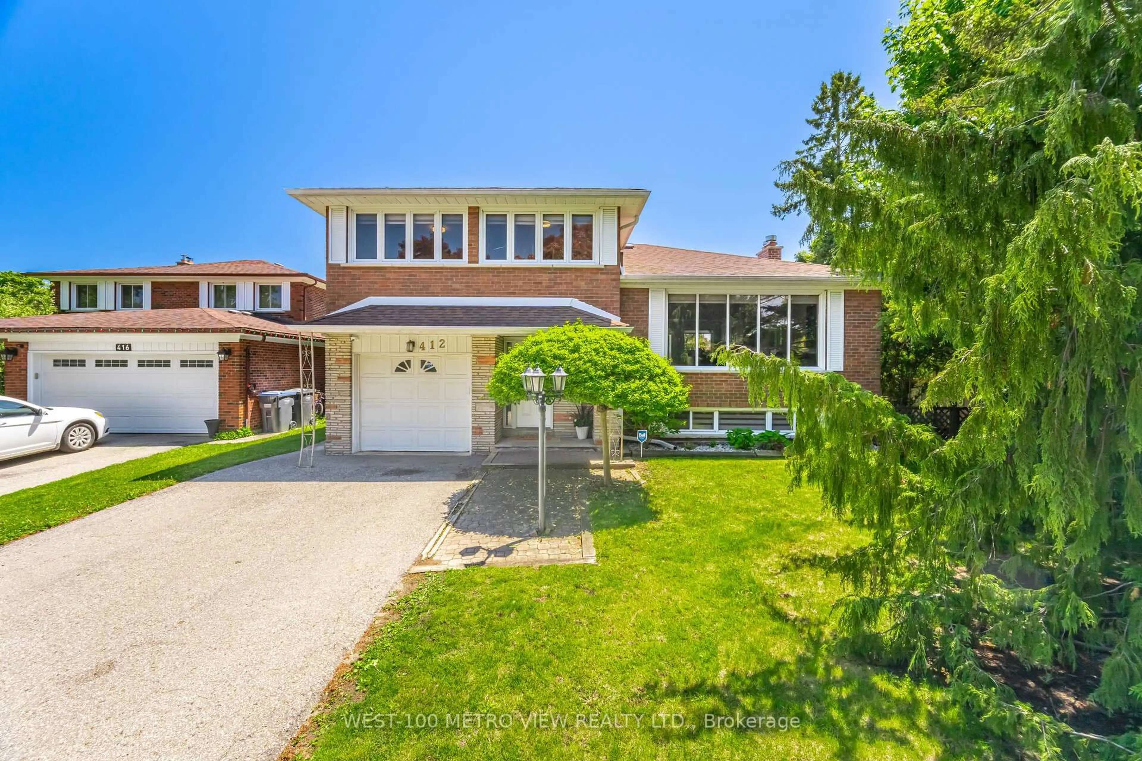 Home with brick exterior material, street for 412 Tedwyn Dr, Mississauga Ontario L5A 1J5