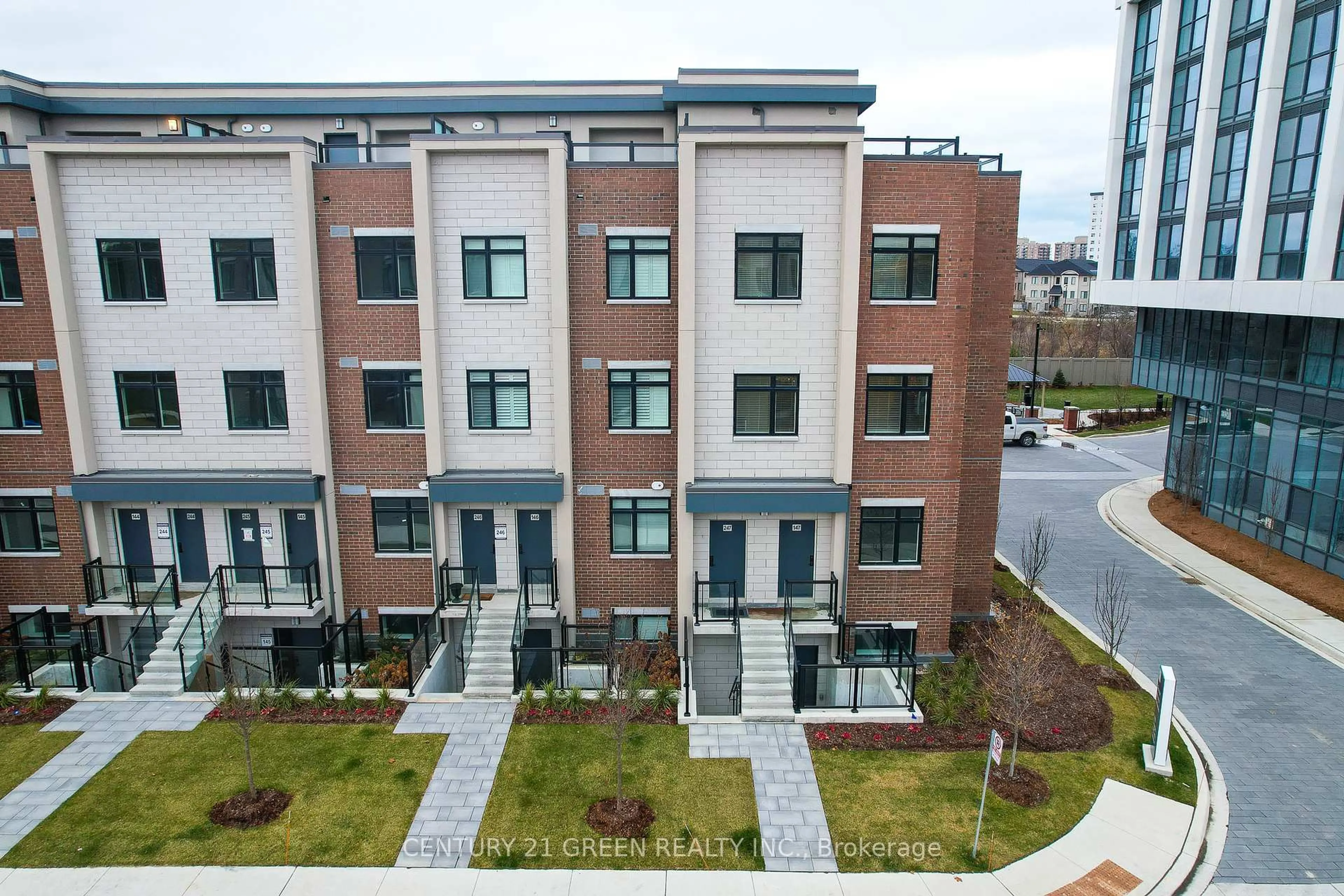 A pic from outside/outdoor area/front of a property/back of a property/a pic from drone, street for 1075 Douglas McCurdy Common #247, Mississauga Ontario L5G 0C6