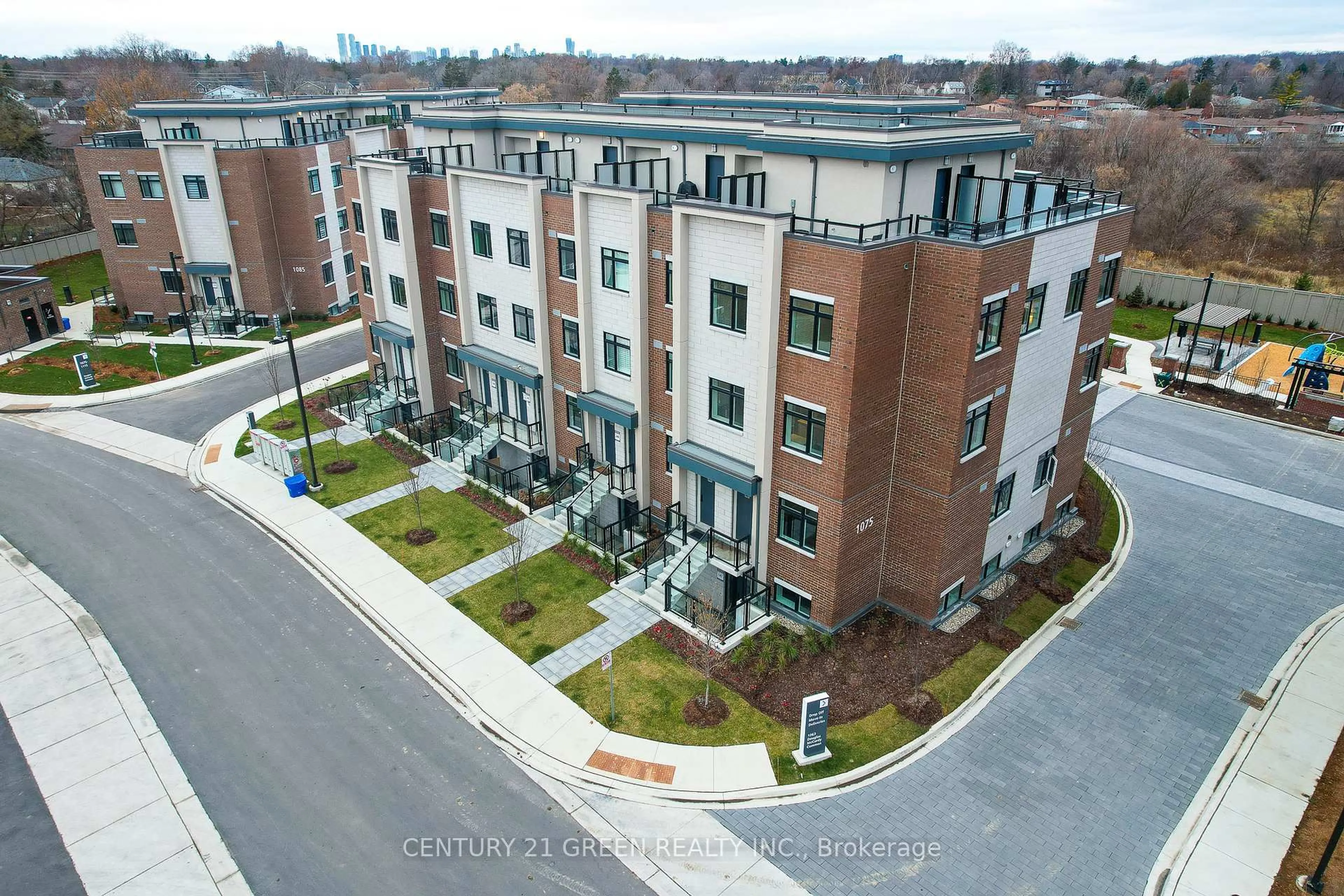 A pic from outside/outdoor area/front of a property/back of a property/a pic from drone, building for 1075 Douglas McCurdy Common #247, Mississauga Ontario L5G 0C6