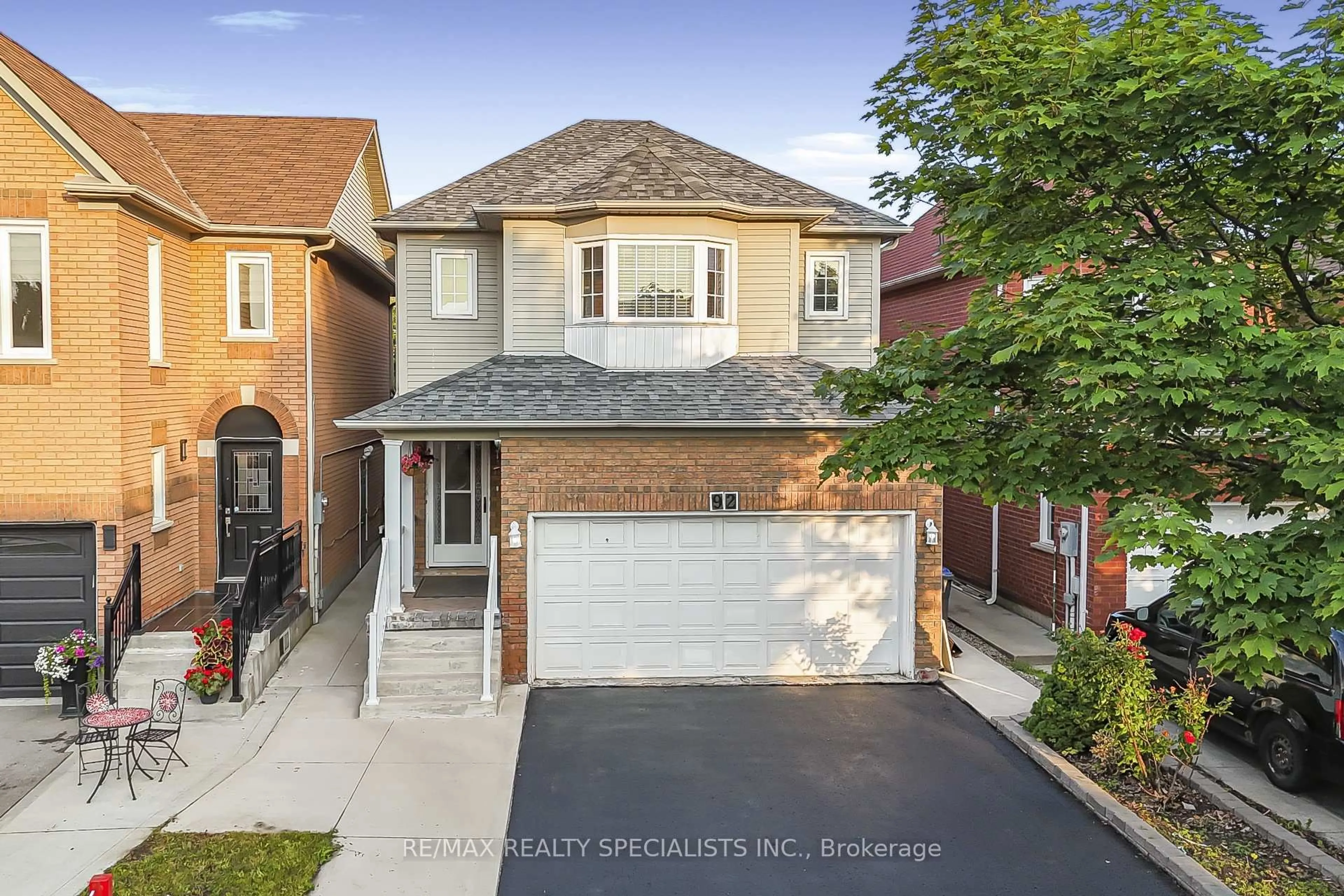 Home with brick exterior material, street for 92 Black Oak Dr, Brampton Ontario L6R 1B8