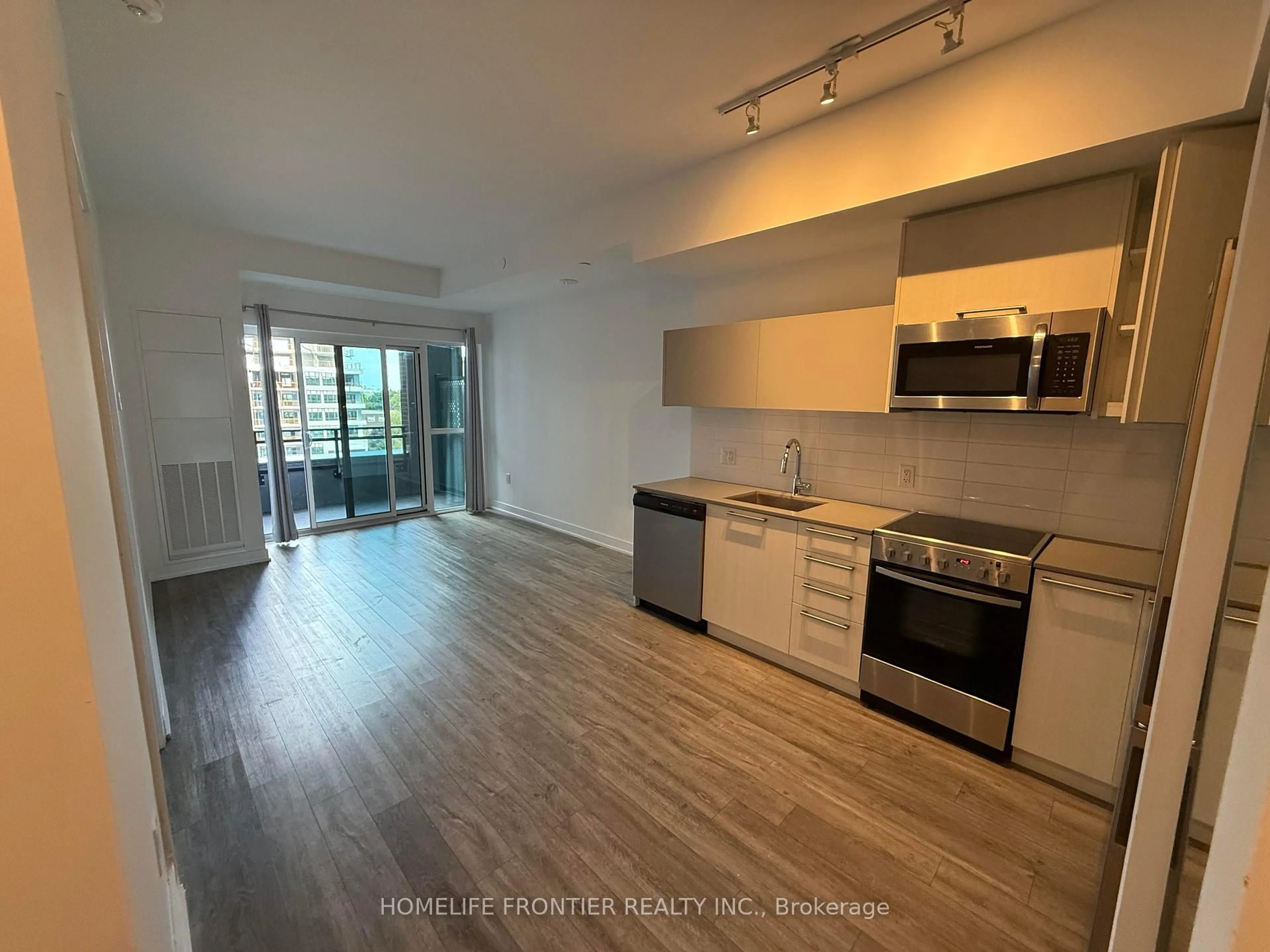 Open concept kitchen, unknown for 25 Neighbourhood Lane #501, Toronto Ontario M8Y 0C4