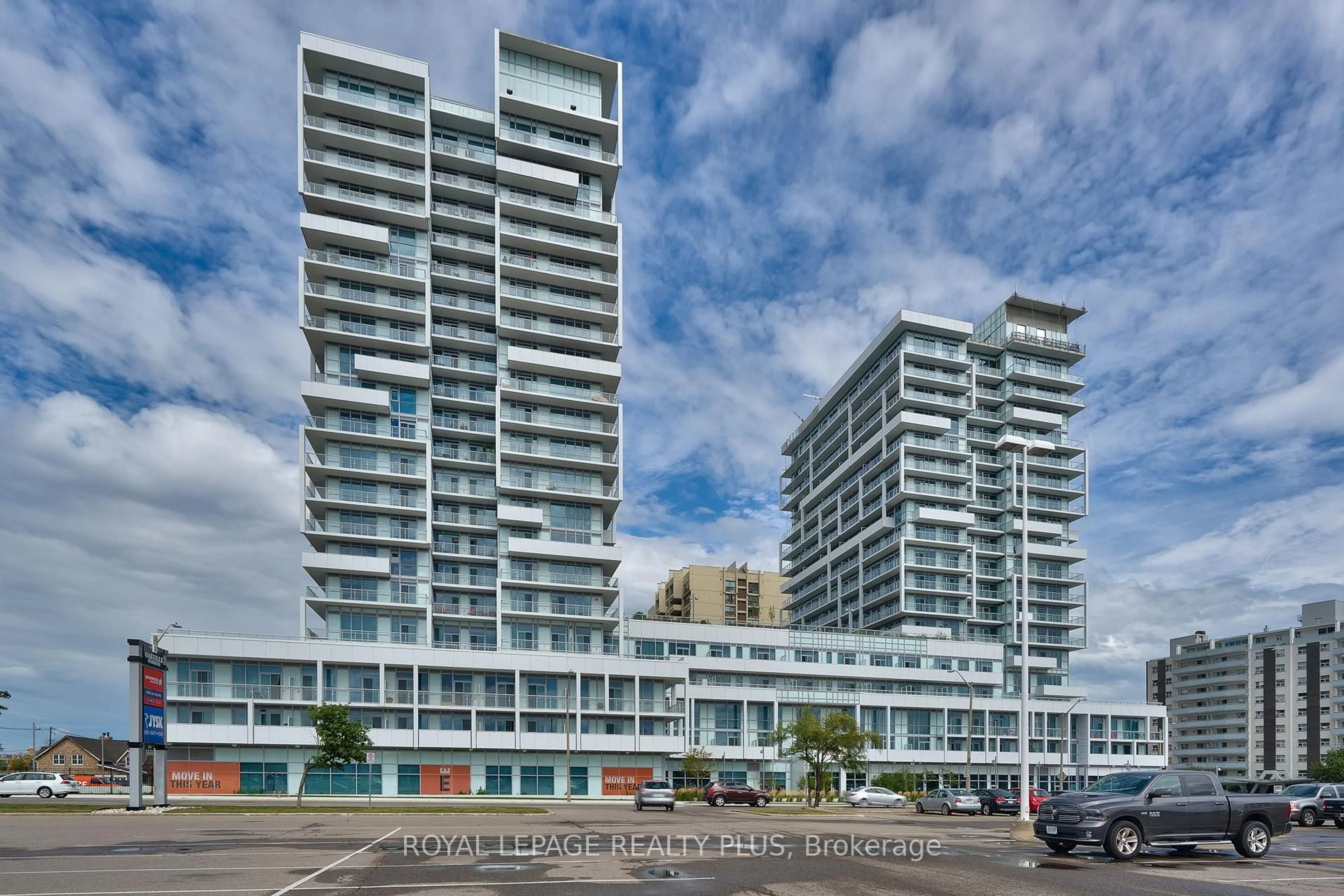 A pic from outside/outdoor area/front of a property/back of a property/a pic from drone, unknown for 65 Speers Rd #406, Oakville Ontario L6K 0J1