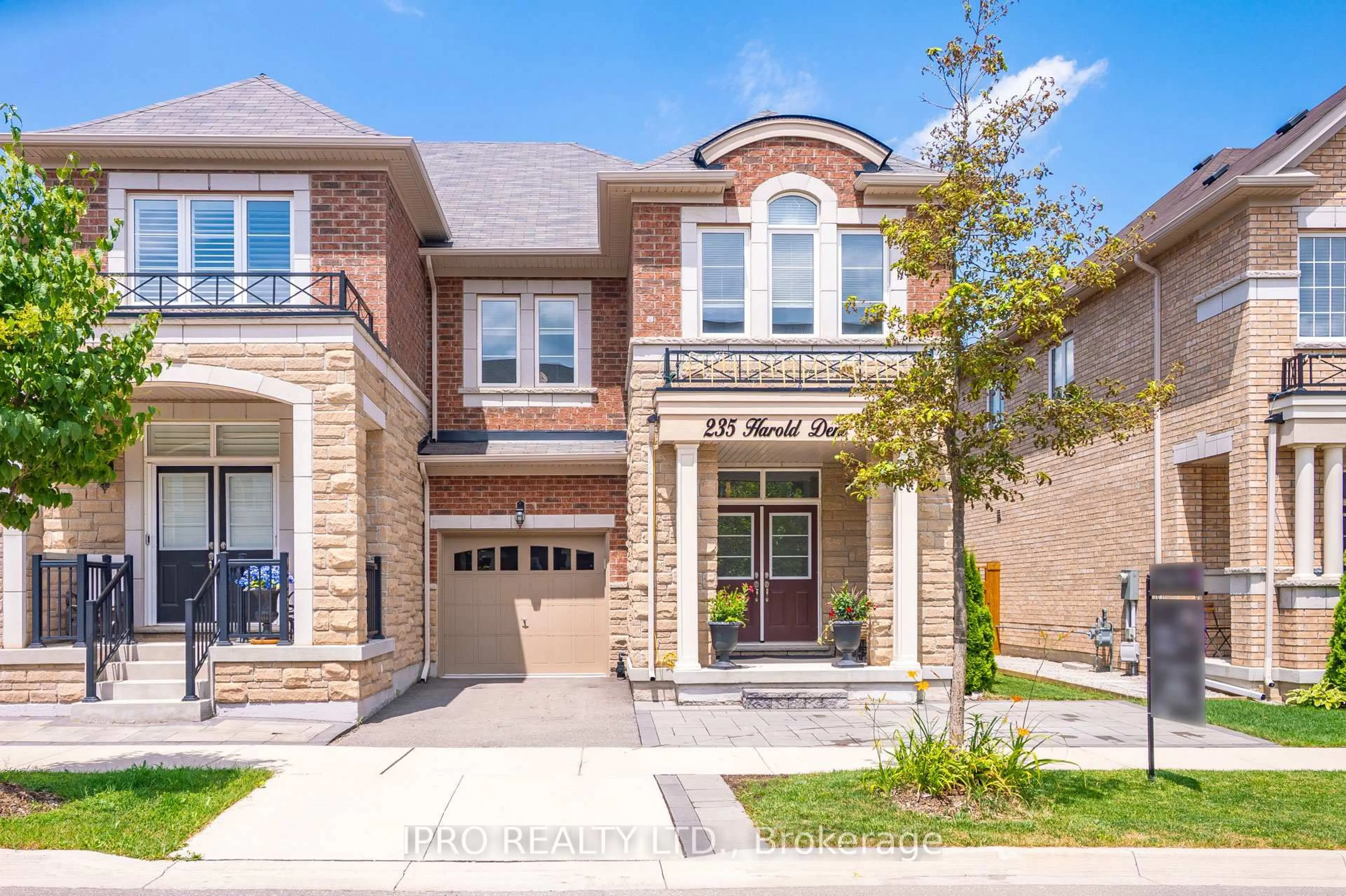 Home with brick exterior material, street for 235 Harold Dent Tr, Oakville Ontario L6M 1S3