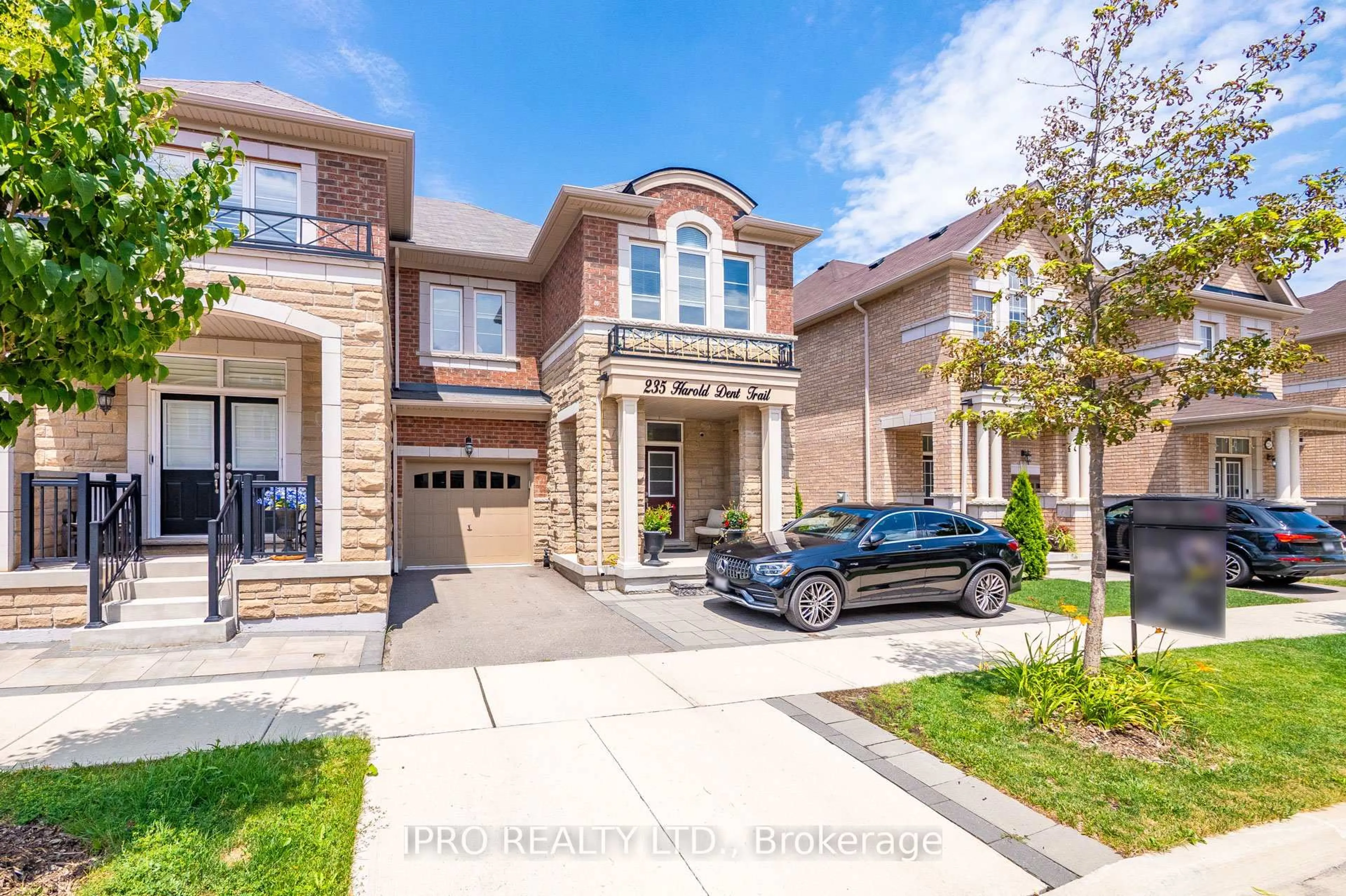 Home with brick exterior material, street for 235 Harold Dent Tr, Oakville Ontario L6M 1S3