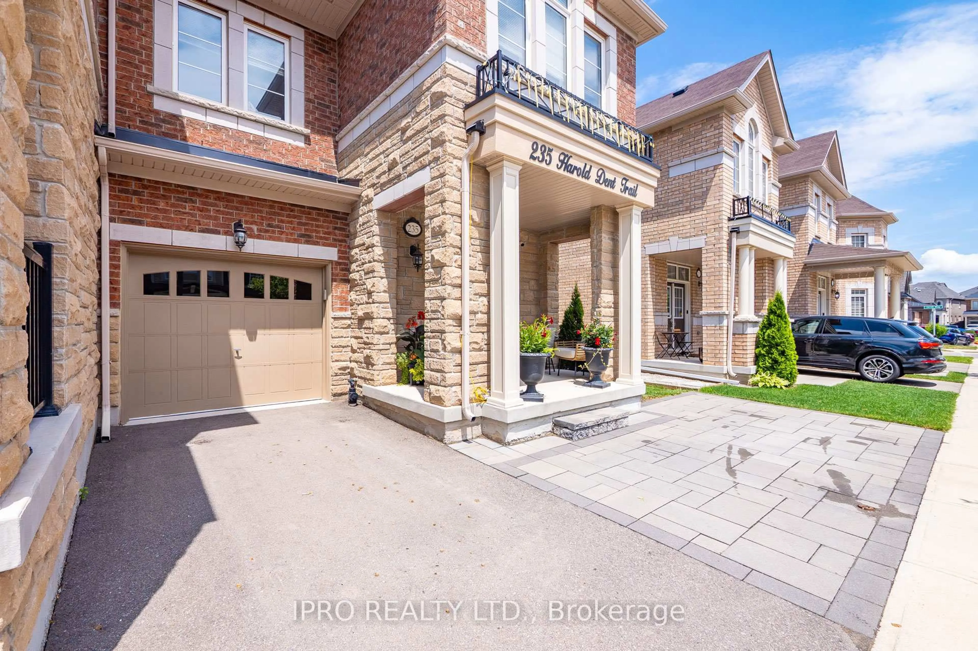 Home with brick exterior material, street for 235 Harold Dent Tr, Oakville Ontario L6M 1S3