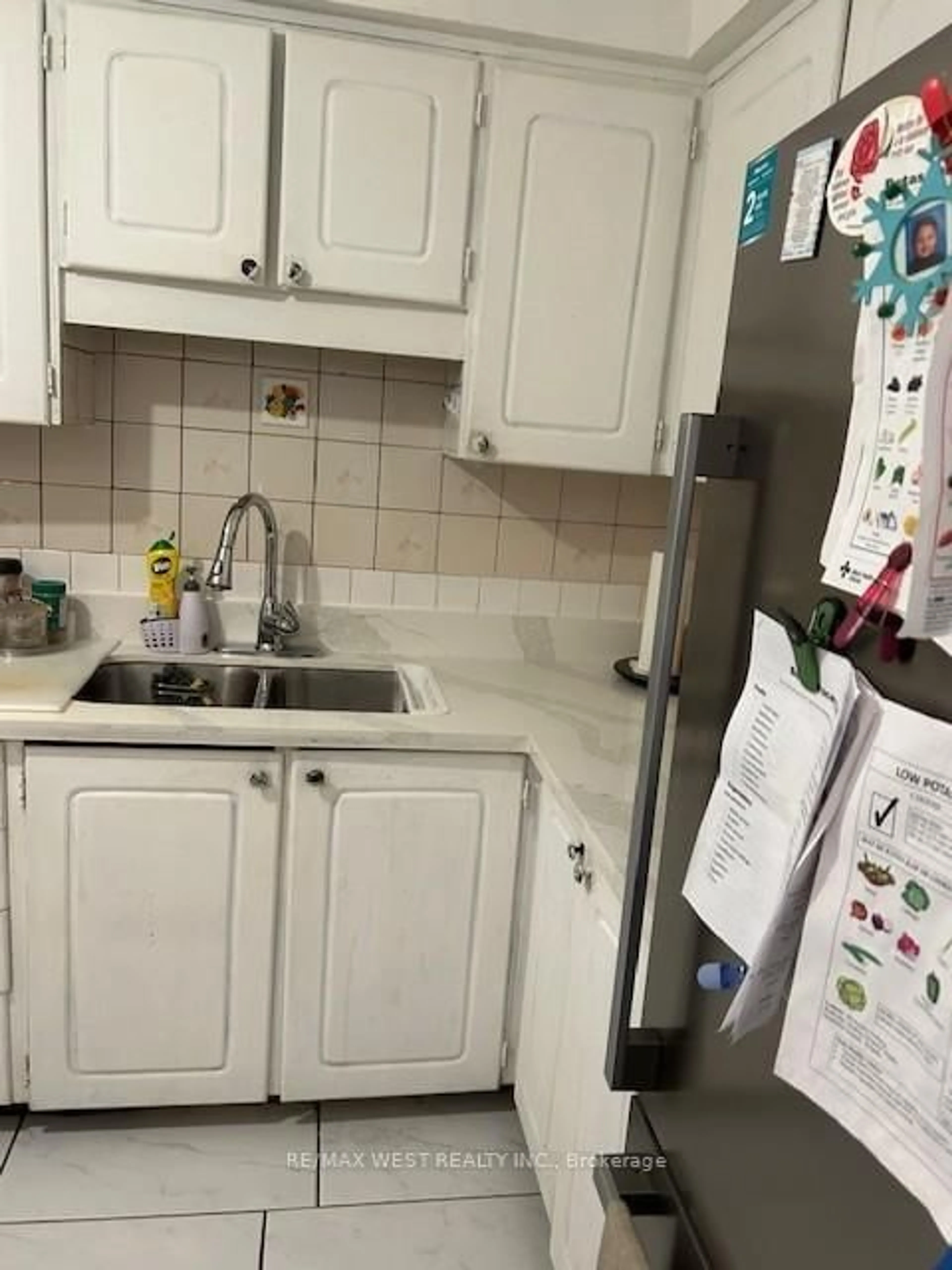 Standard kitchen, floor is not visible for 252 John Garland Blvd #161, Toronto Ontario M9V 1N8
