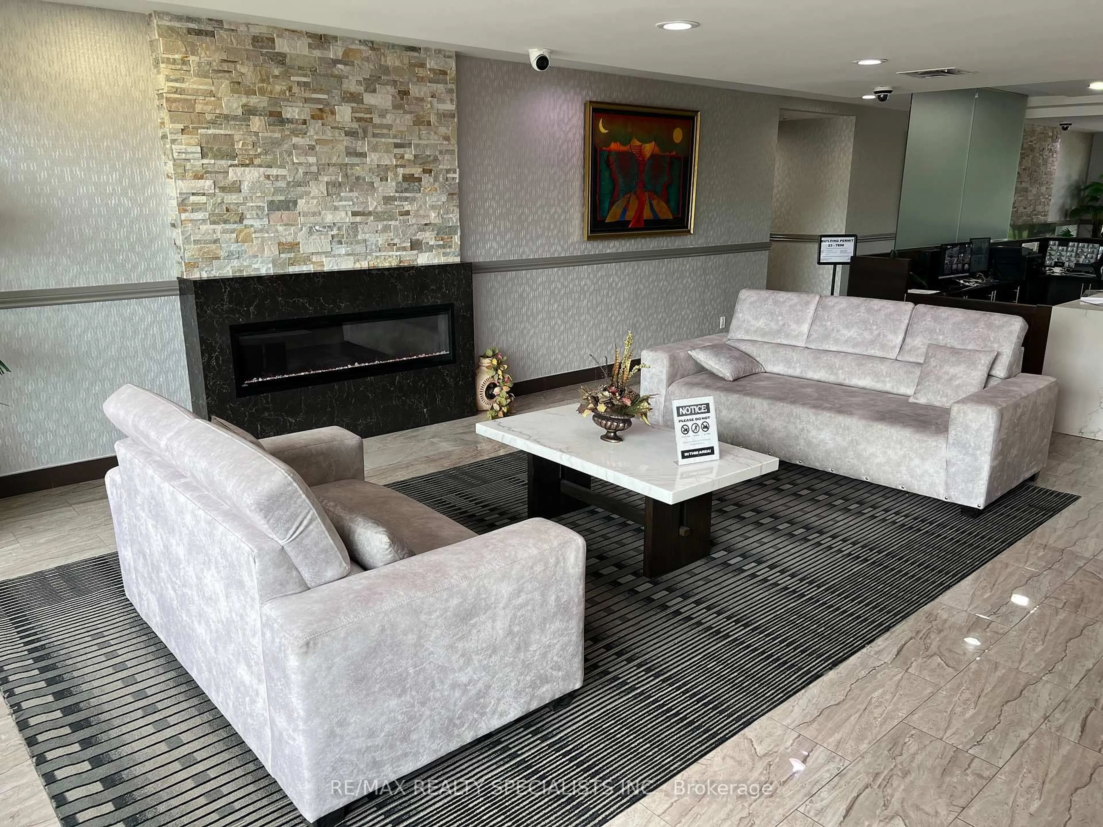 Living room with furniture, unknown for 145 Hillcrest Ave #303, Mississauga Ontario L5B 3Z1