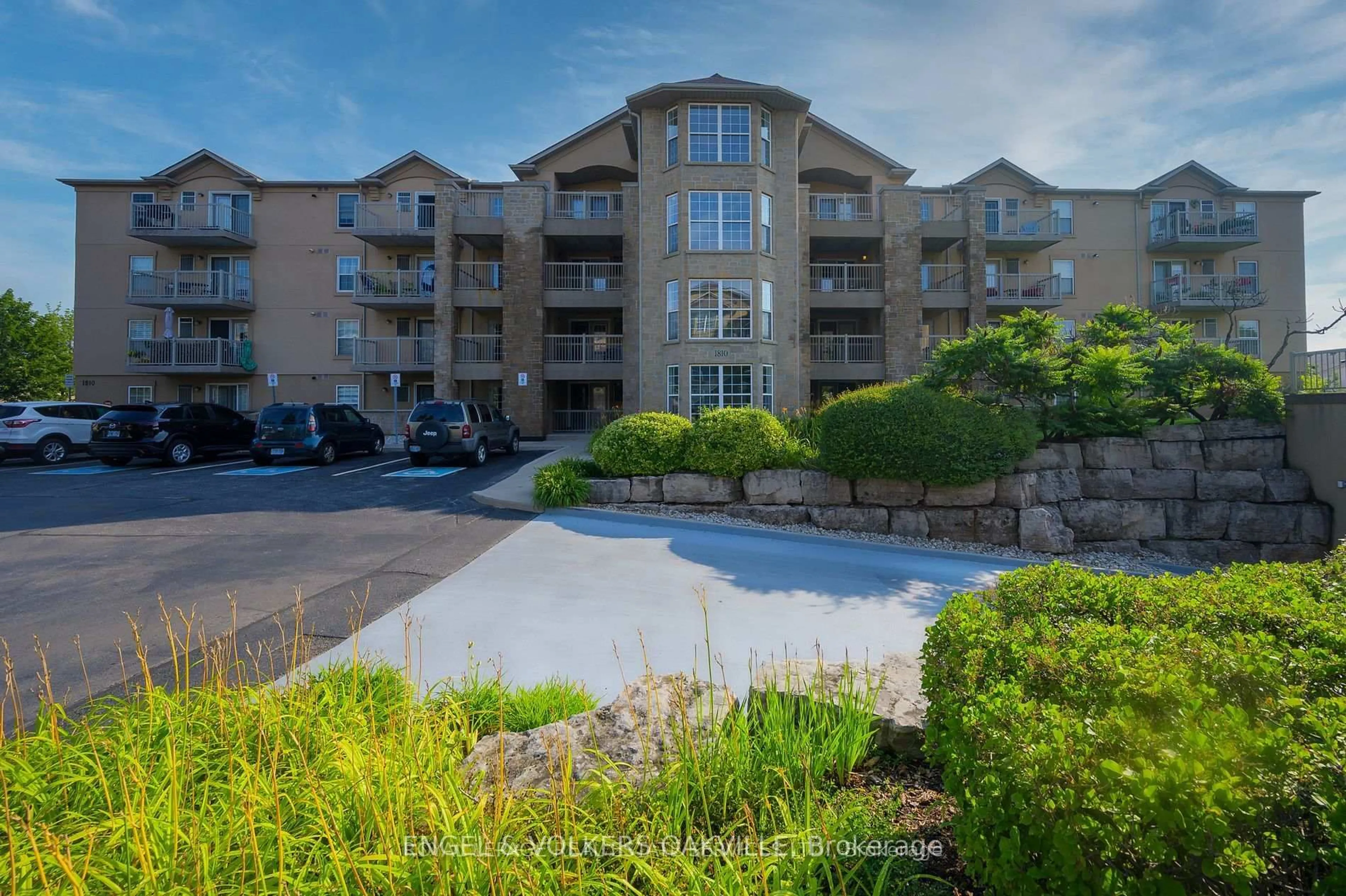 A pic from outside/outdoor area/front of a property/back of a property/a pic from drone, water/lake/river/ocean view for 1810 Walkers Line #308, Burlington Ontario L7M 4V3