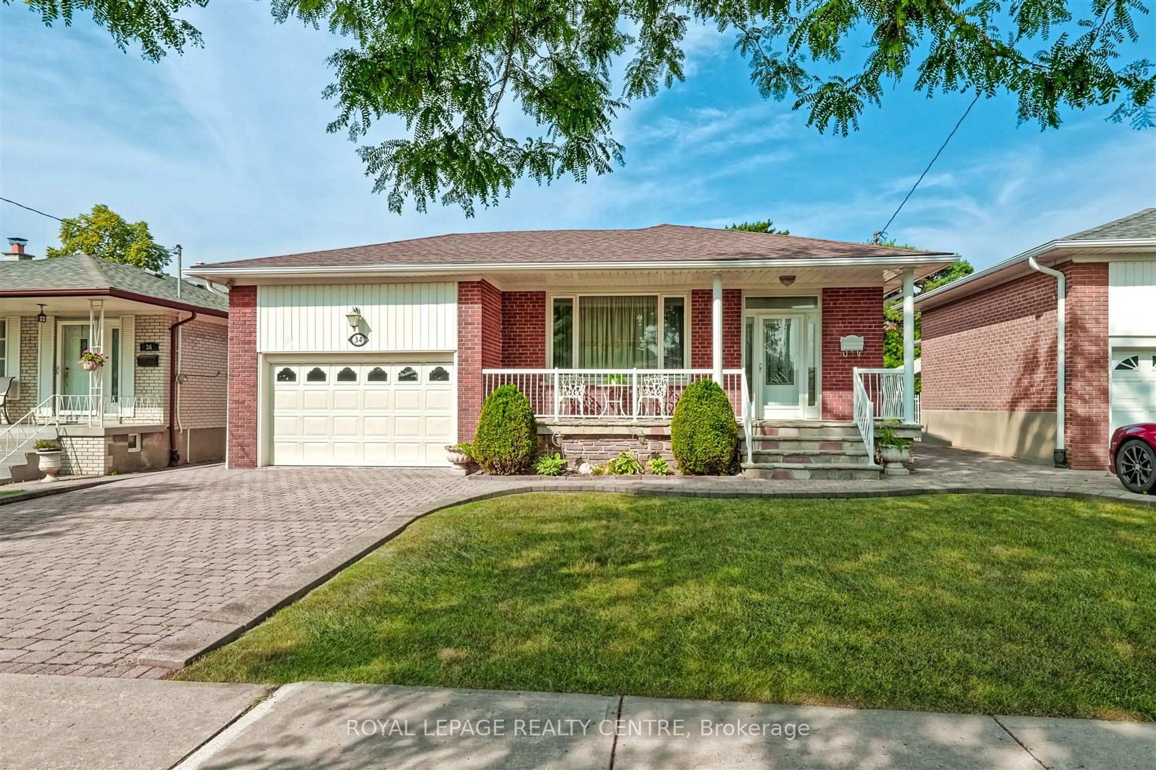 Home with brick exterior material, street for 34 Renova Dr, Toronto Ontario M9C 3E9