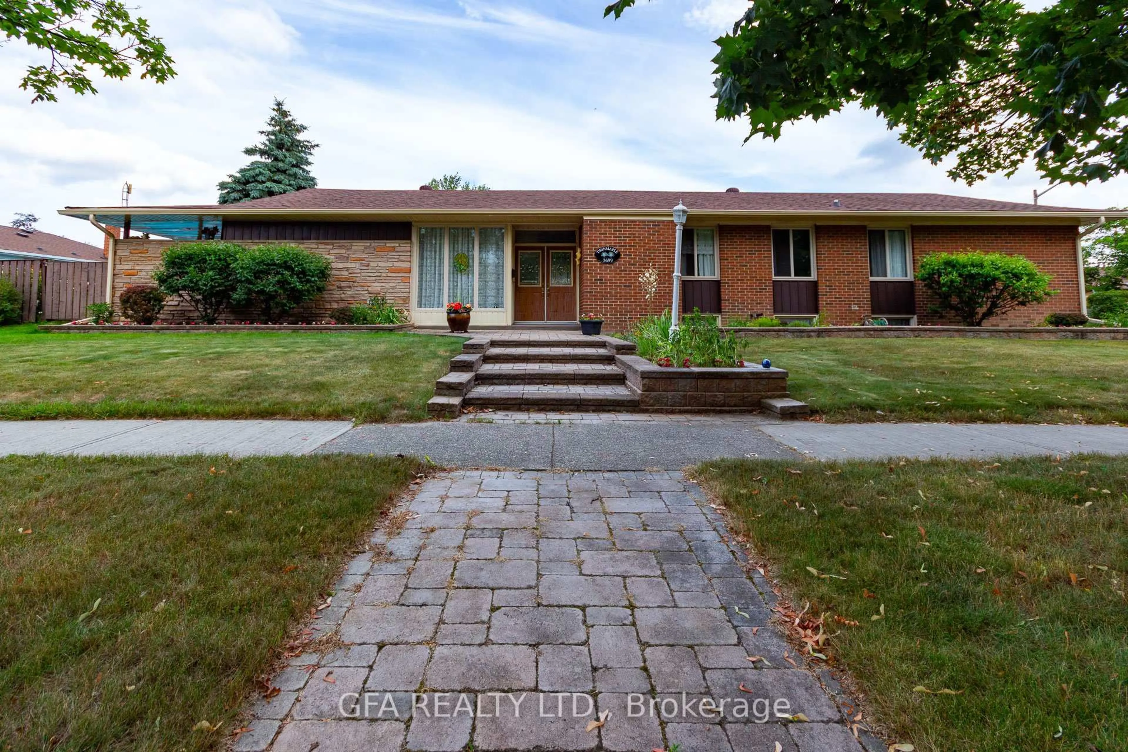 Home with brick exterior material, street for 3699 Twinmaple Dr, Mississauga Ontario L4Y 3R6