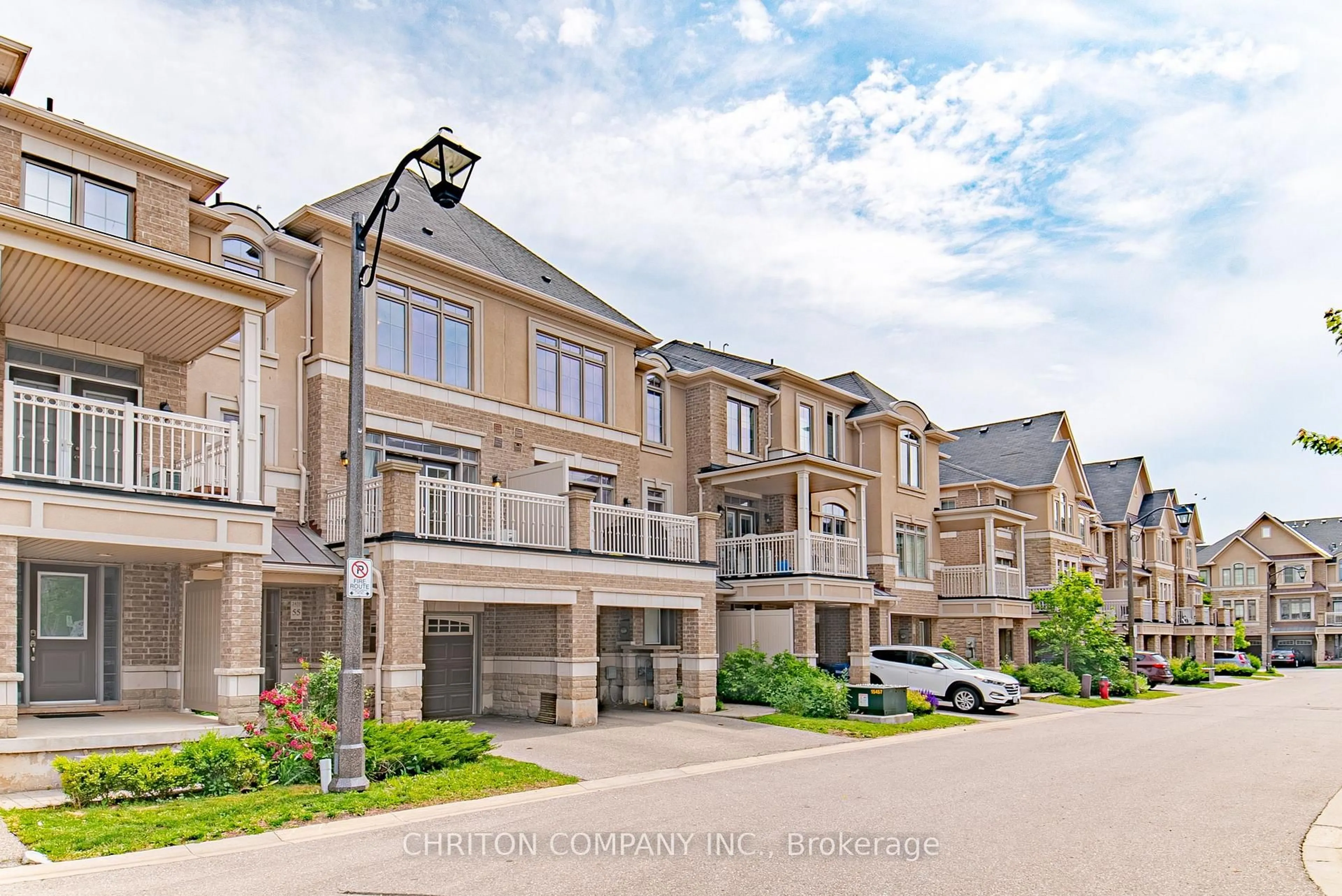 A pic from outside/outdoor area/front of a property/back of a property/a pic from drone, street for 2435 Greenwich Dr #55, Oakville Ontario L6M 0S4