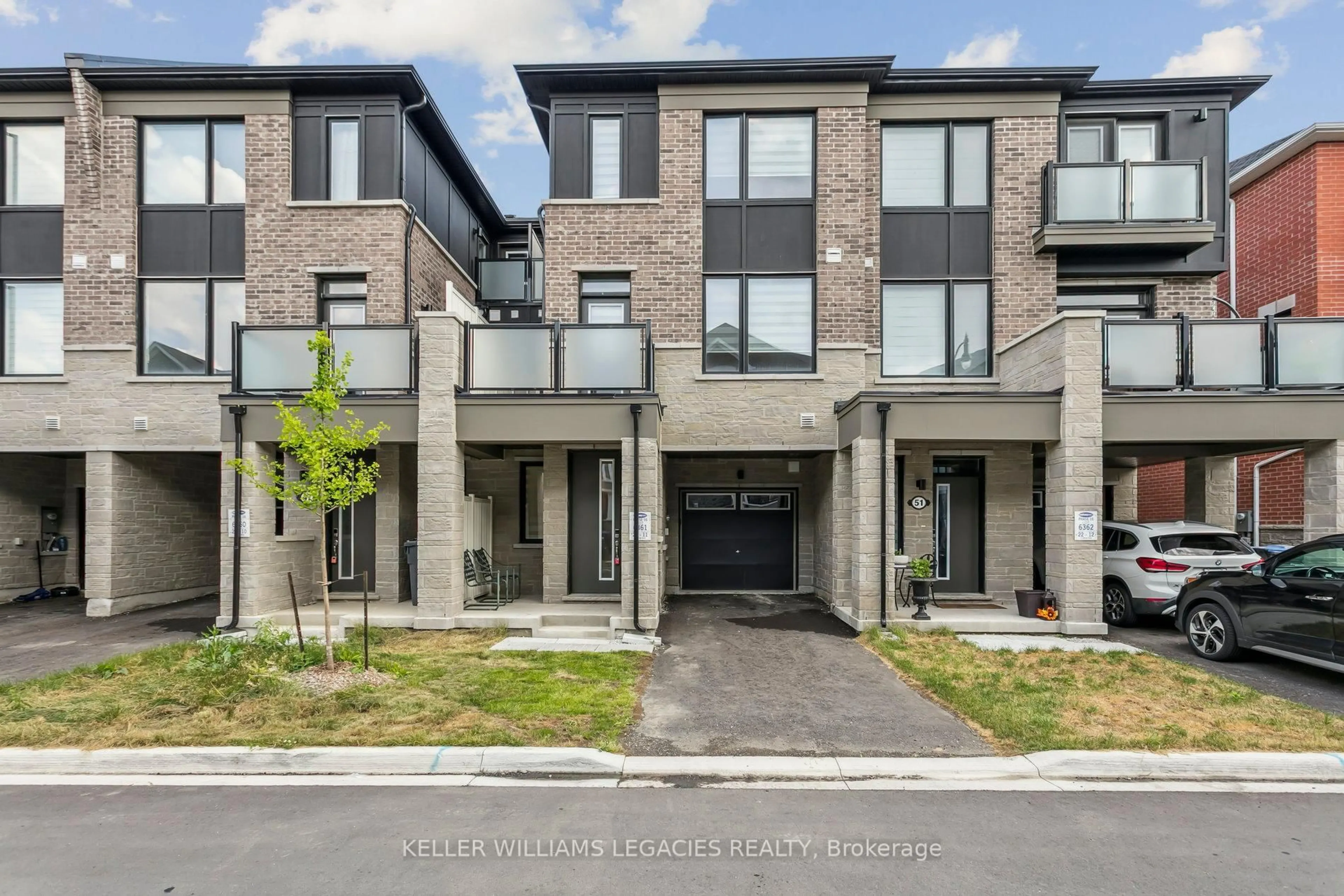 Home with brick exterior material, street for 49 Melmar St, Brampton Ontario L7A 5K5