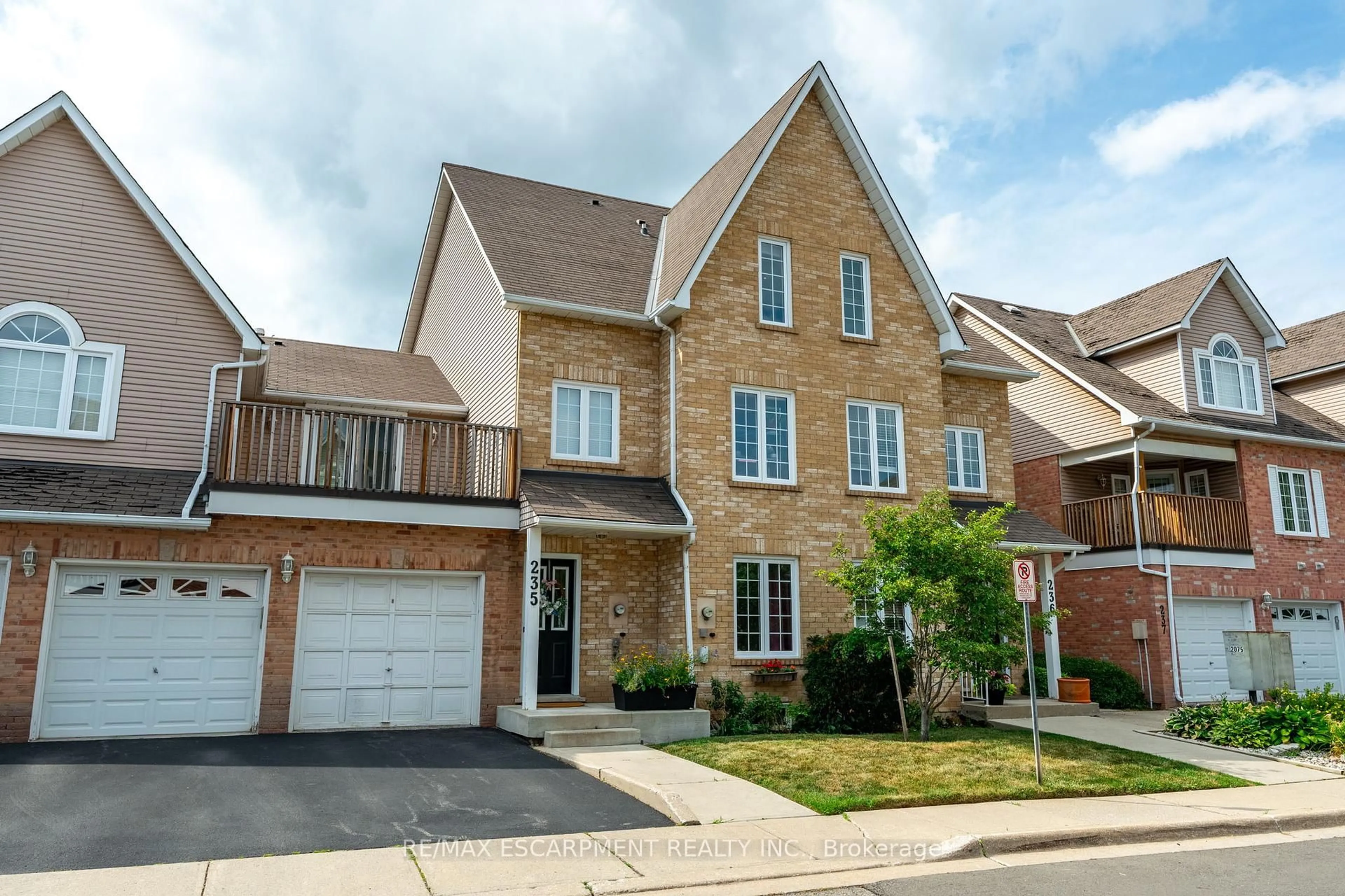 Home with brick exterior material, street for 2075 Walkers Line #235, Burlington Ontario L7M 4G7