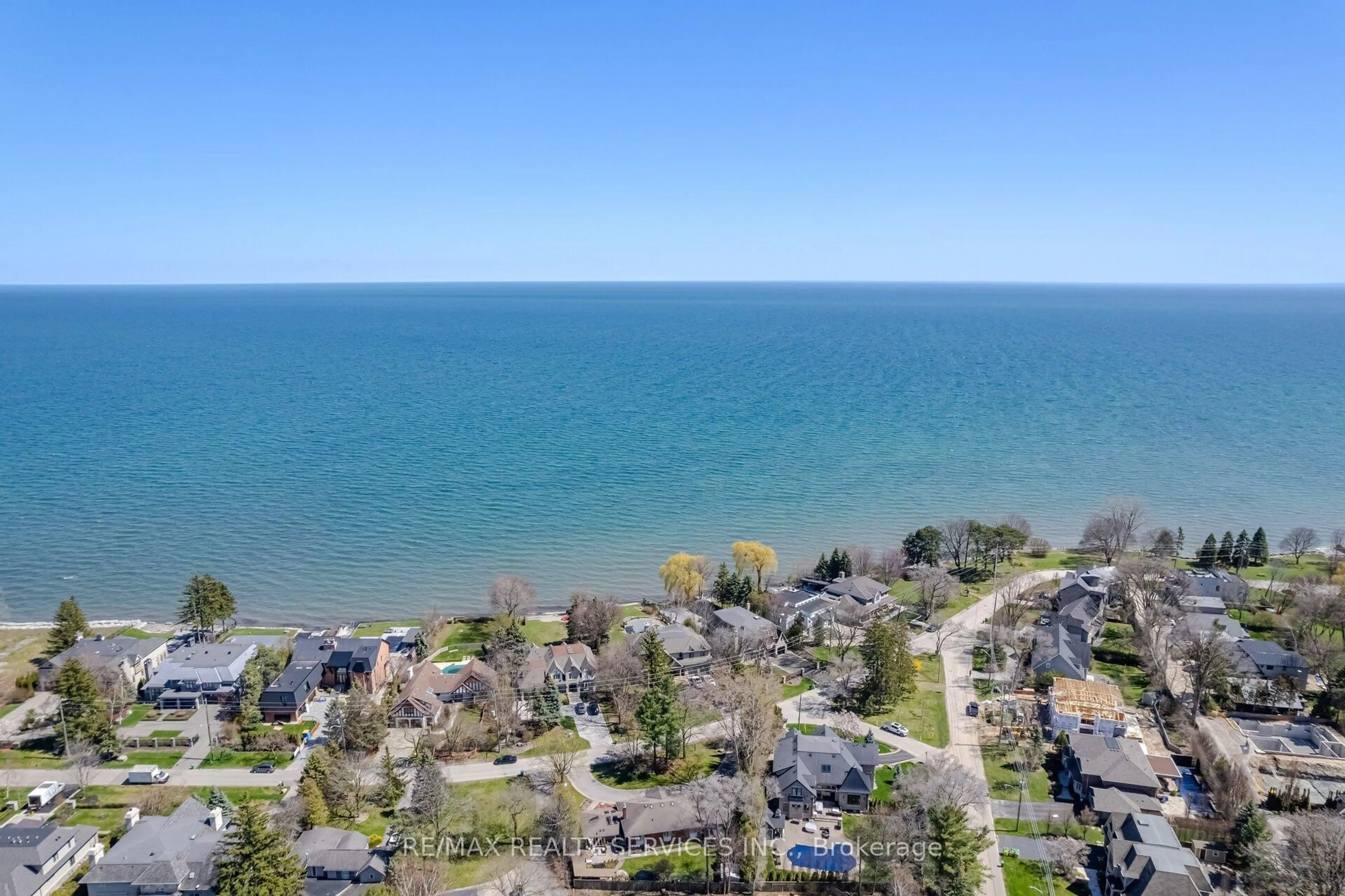 A pic from outside/outdoor area/front of a property/back of a property/a pic from drone, water/lake/river/ocean view for 1607 Watersedge Rd, Mississauga Ontario L5J 1A6