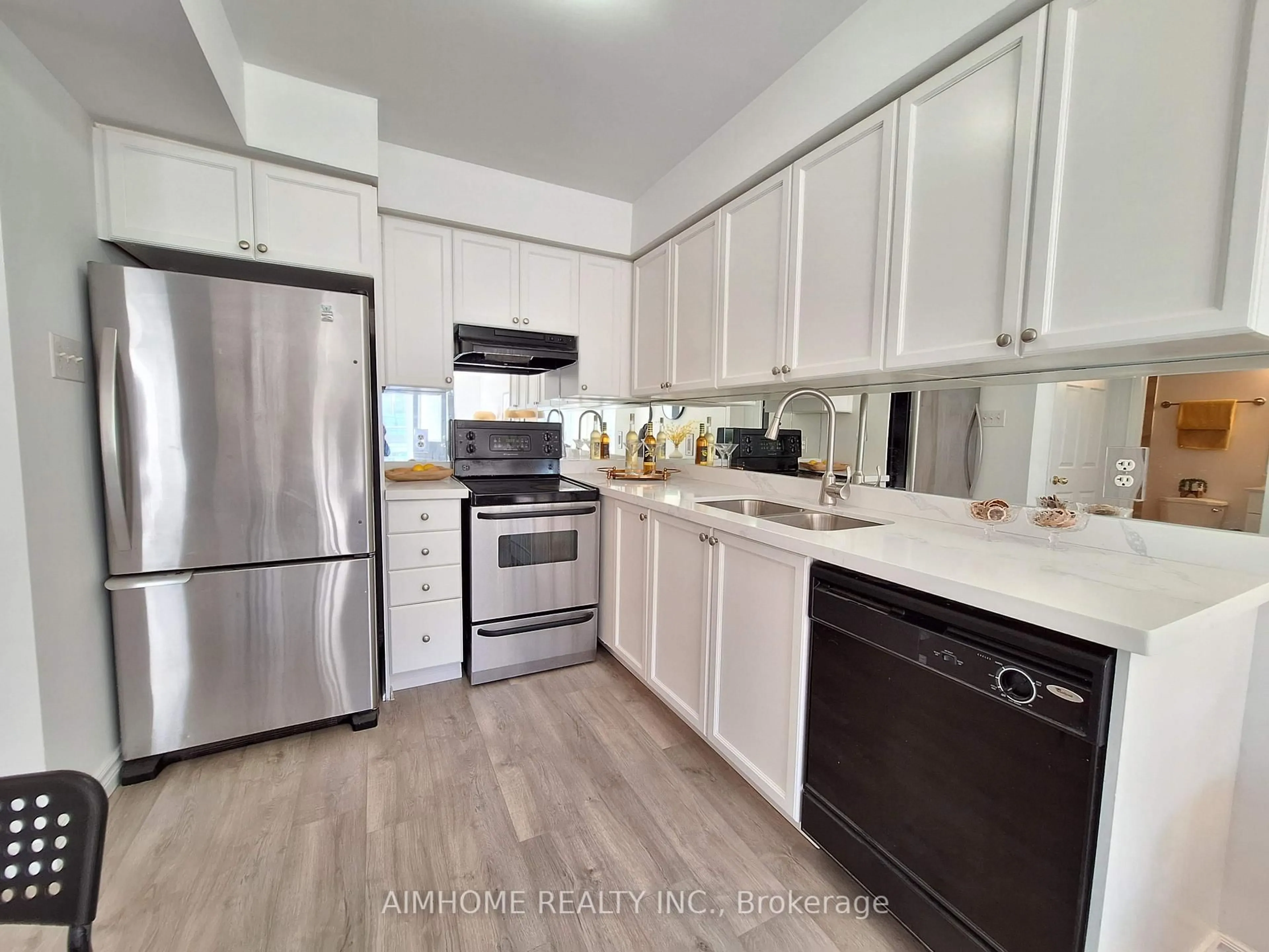 Open concept kitchen, unknown for 4975 Southampton Dr #318, Mississauga Ontario L5M 8E6