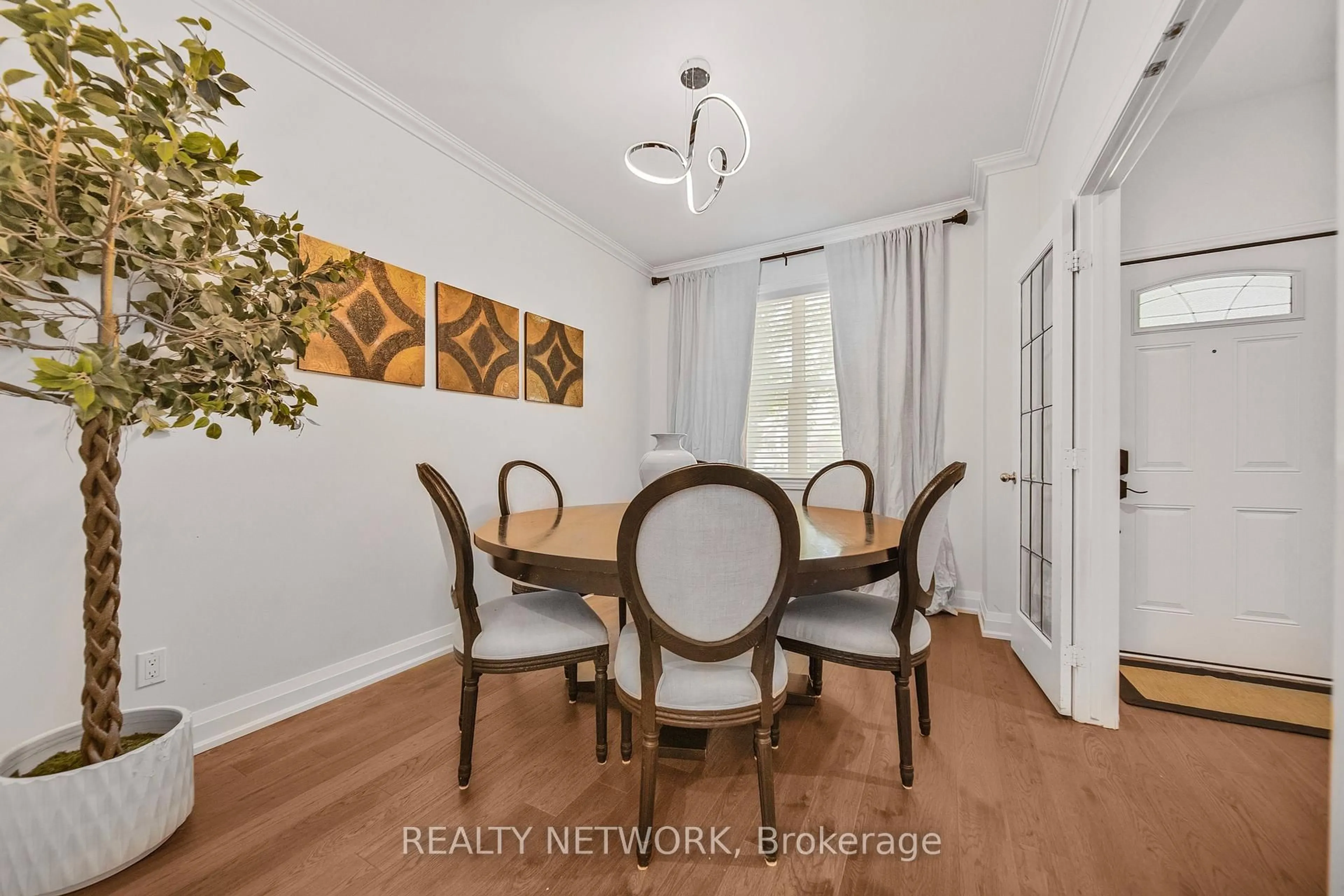 Dining room, wood/laminate floor for 87 Mississaga St, Oakville Ontario L6L 3A5