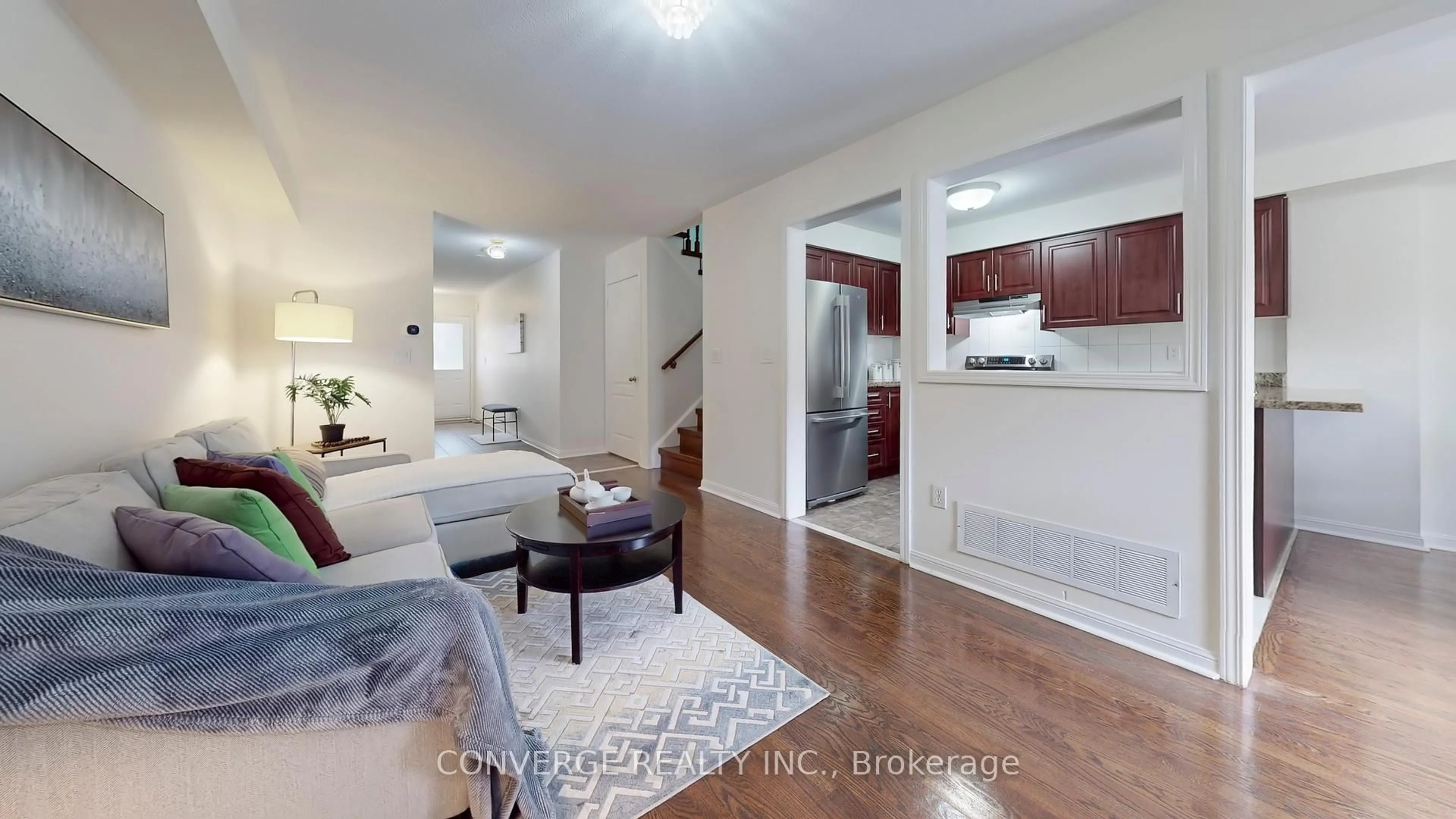 Living room with furniture, wood/laminate floor for 3951 Freeman Terr, Mississauga Ontario L5M 6R2