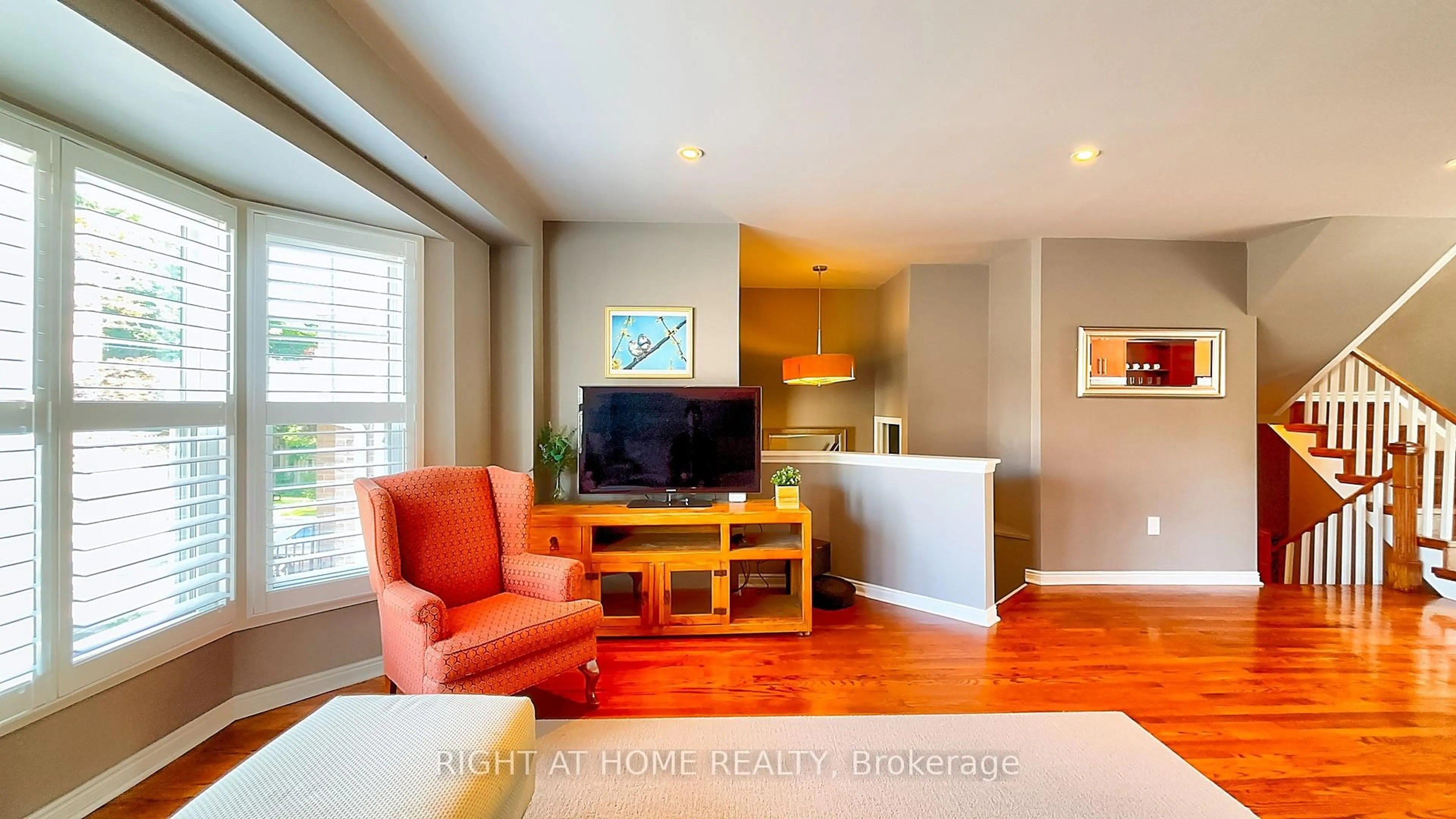 Living room with furniture, wood/laminate floor for 50 Tamarack Circ, Toronto Ontario M9P 3T9