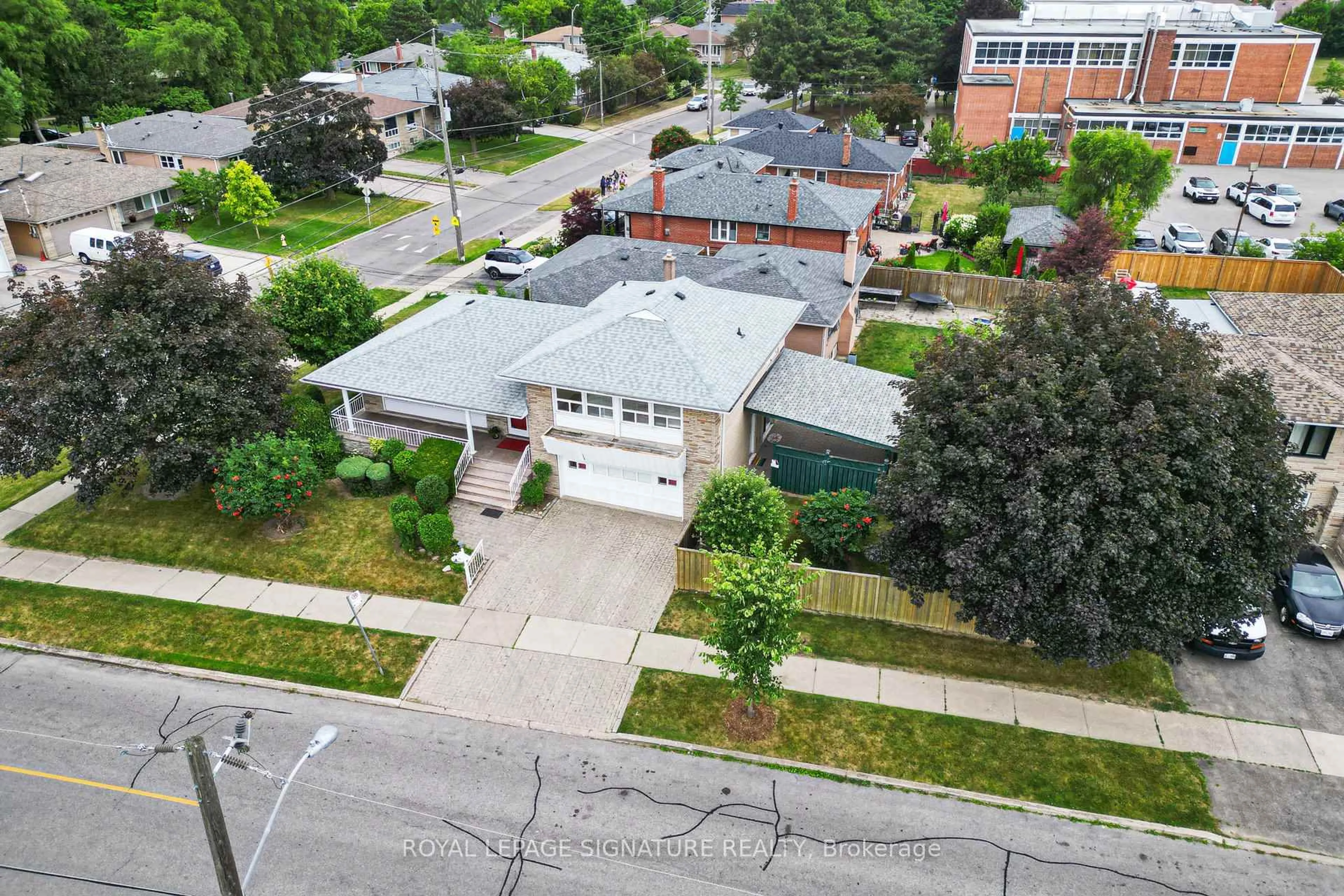 A pic from outside/outdoor area/front of a property/back of a property/a pic from drone, street for 63 Sparrow Ave, Toronto Ontario M6A 1L5