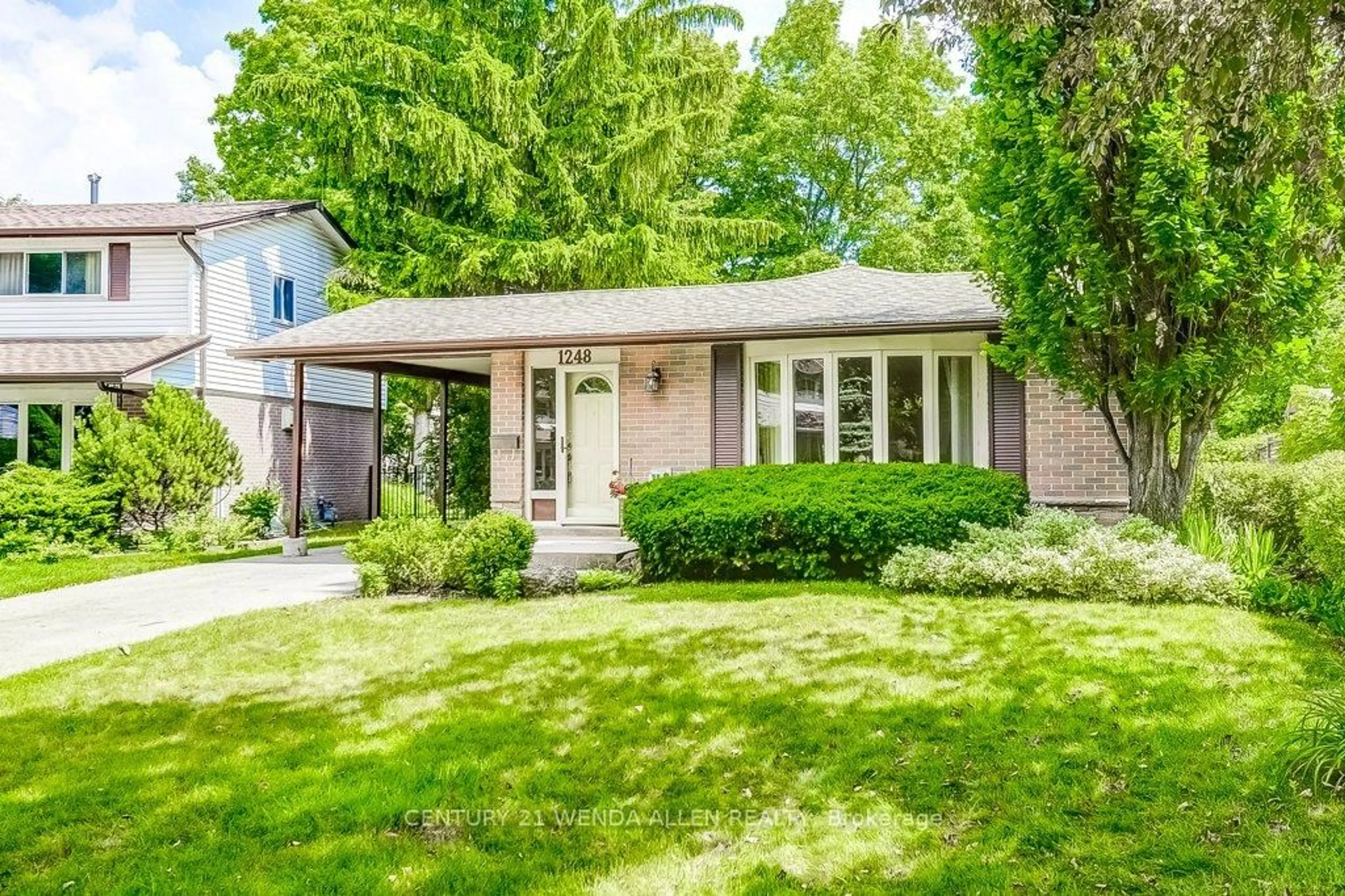 Home with brick exterior material, street for 1248 Sycamore Dr, Burlington Ontario L7M 1G9