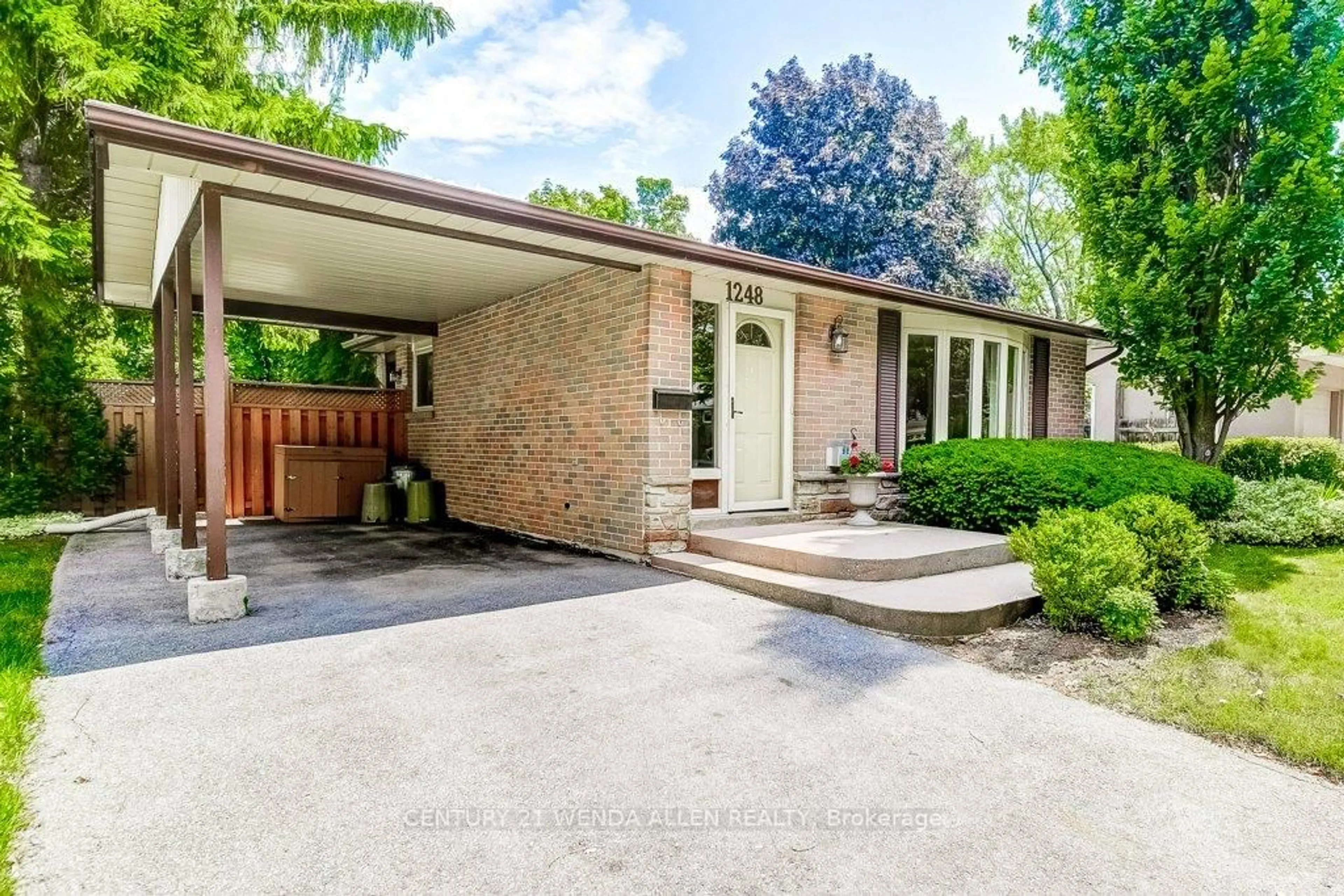 Home with brick exterior material, street for 1248 Sycamore Dr, Burlington Ontario L7M 1G9