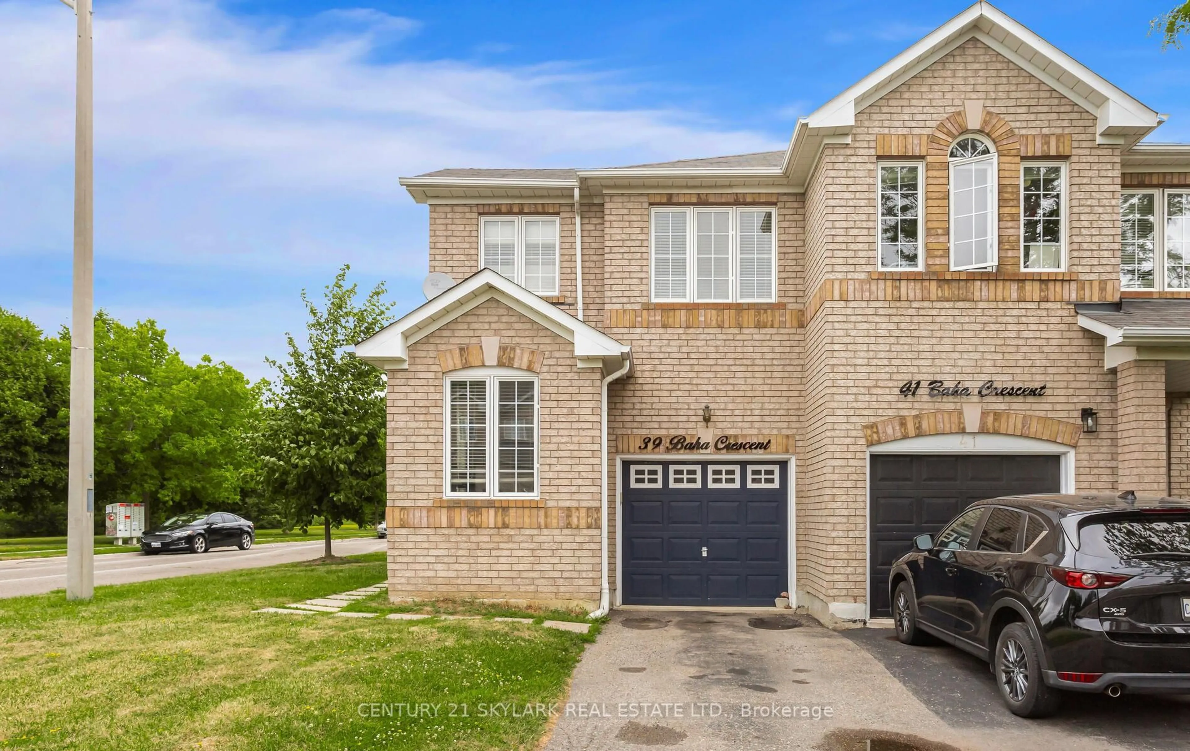 Home with brick exterior material, street for 39 Baha Cres, Brampton Ontario L7A 2J3