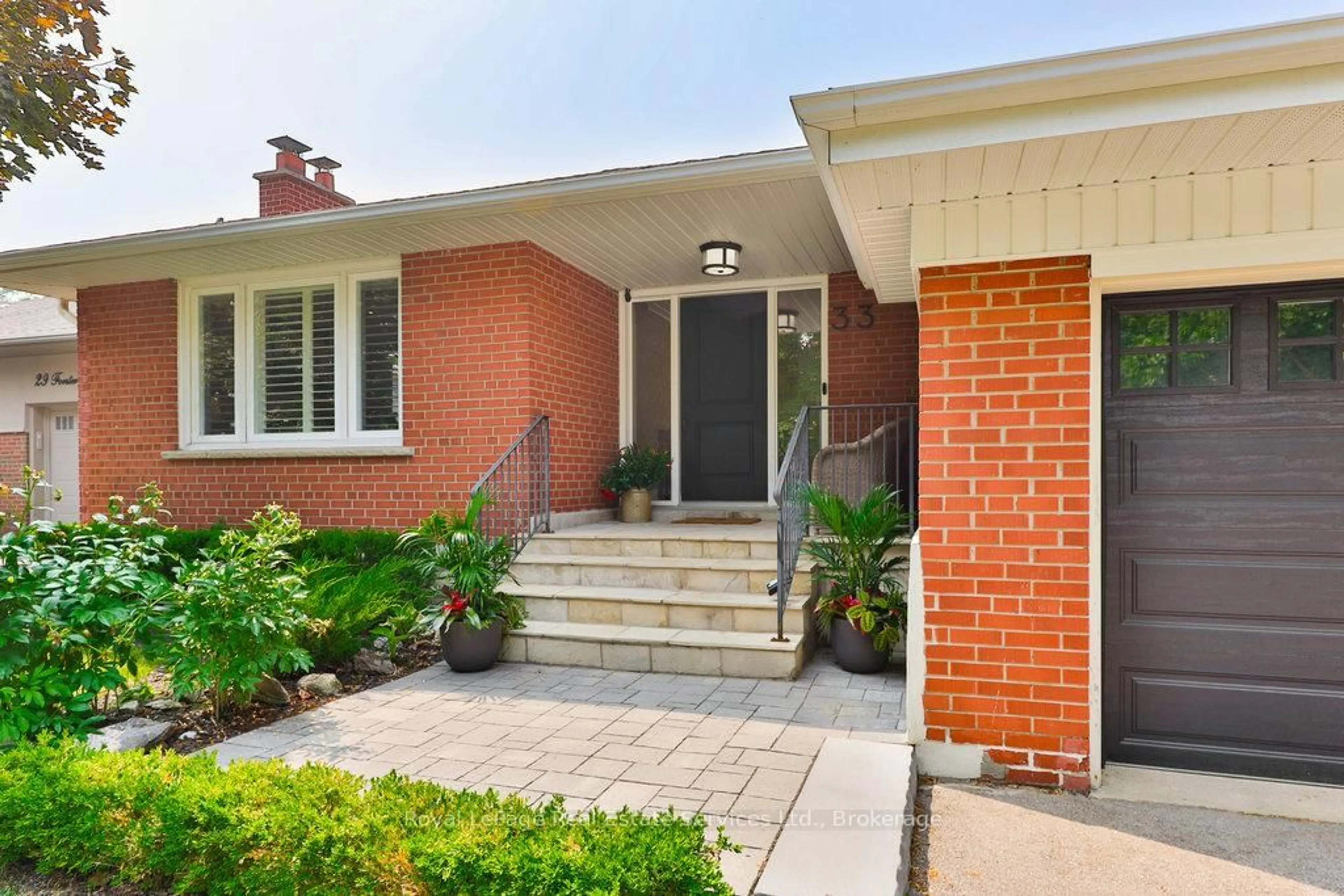 Home with brick exterior material, street for 33 Forster Park Dr, Oakville Ontario L6K 1Y5