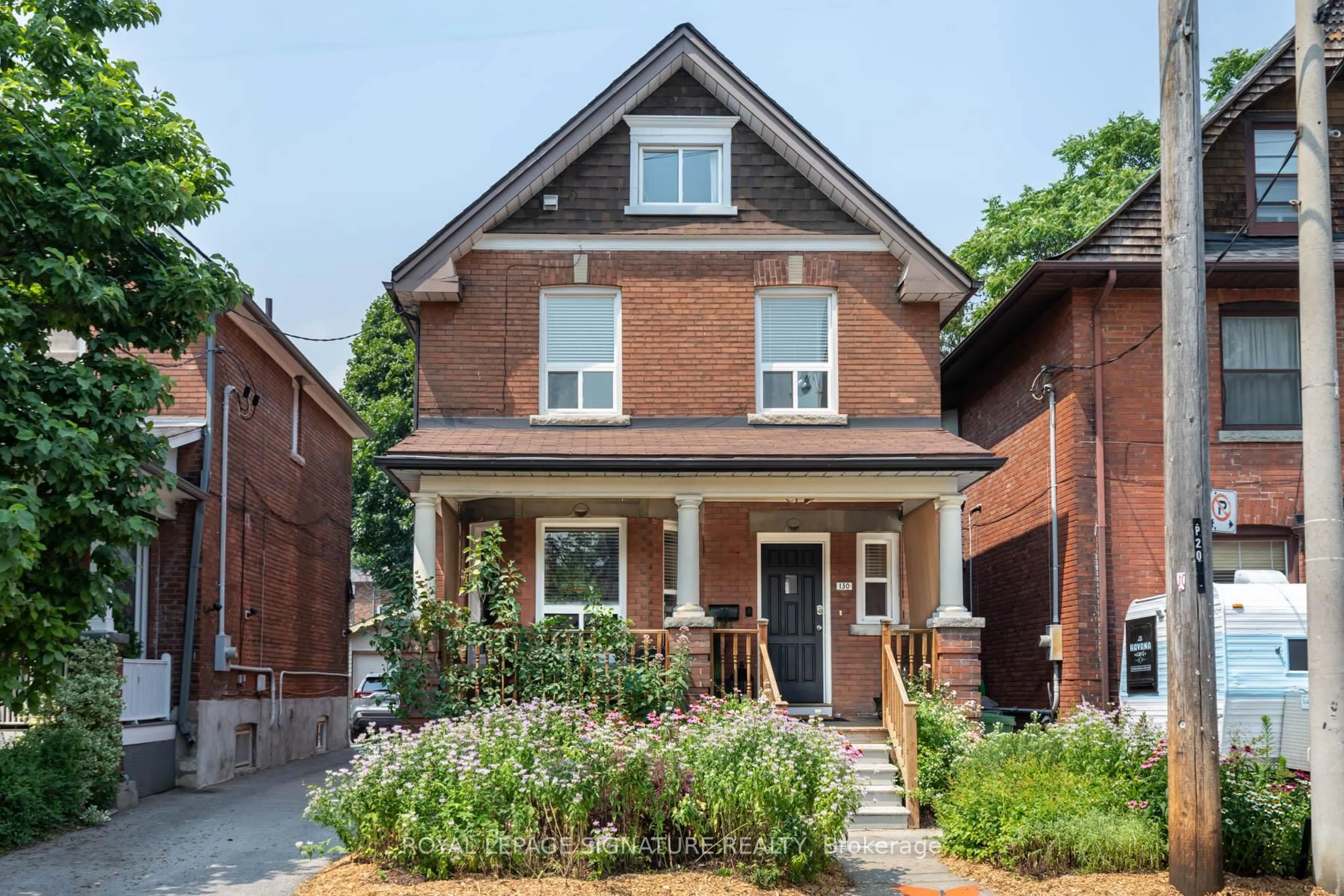Home with brick exterior material, street for 130 St. Johns Rd, Toronto Ontario M6P 1T9