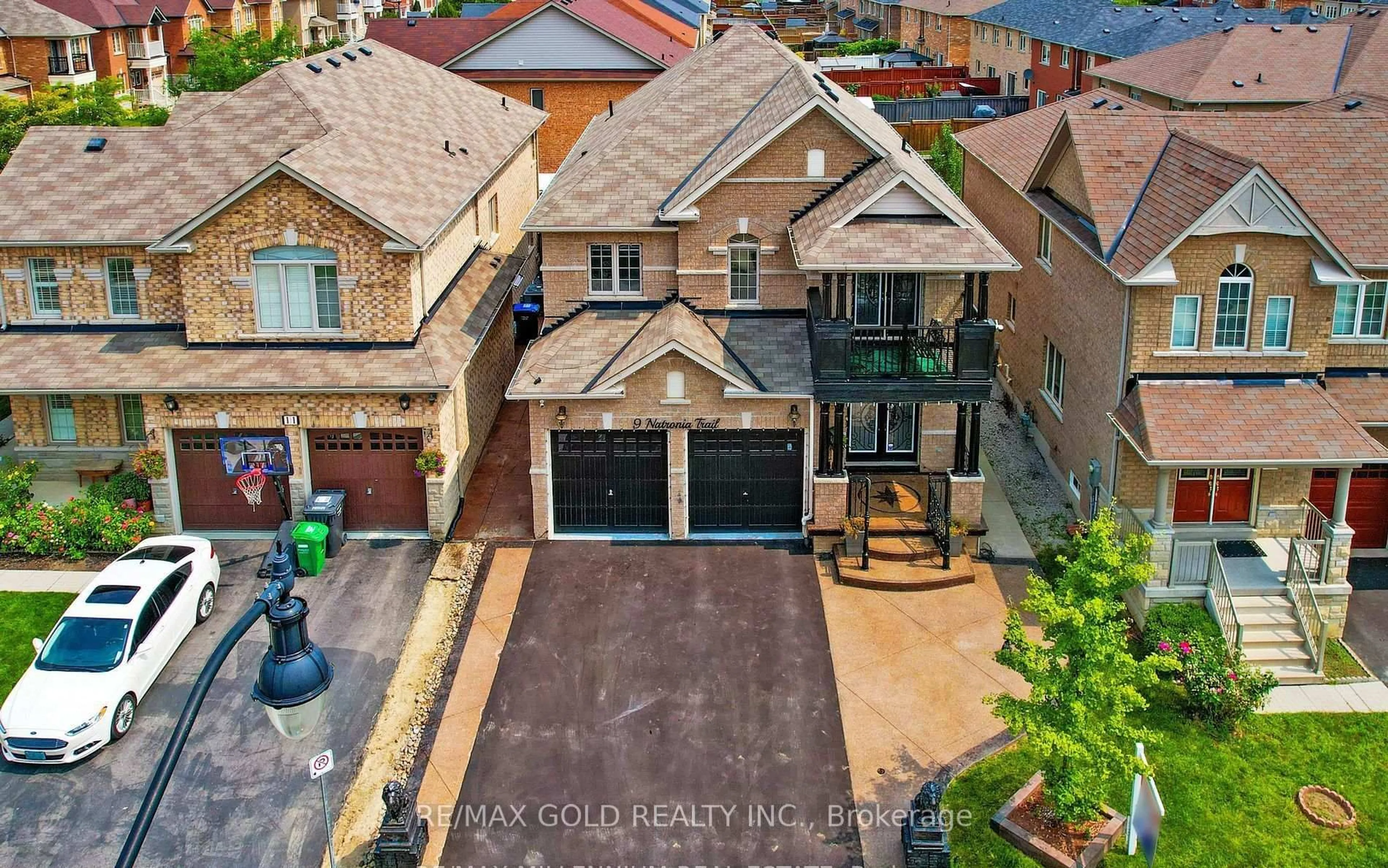 A pic from outside/outdoor area/front of a property/back of a property/a pic from drone, street for 9 Natronia Tr, Brampton Ontario L6P 3N1